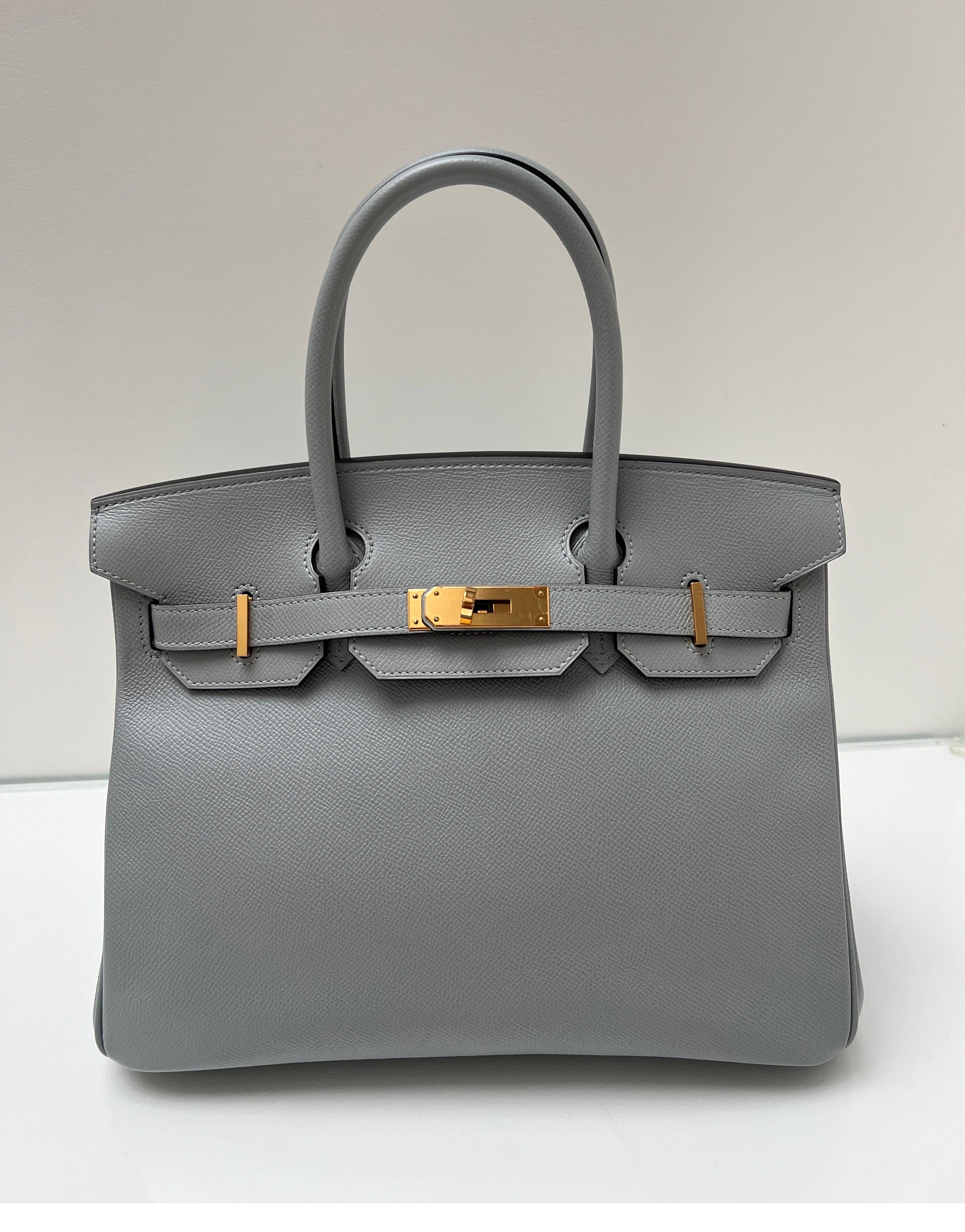 Hermes Gris Mouette Birkin 30 Bag. Excellent like new condition. Looks unused and gift worthy. Stunning color and gold hardware.  Newer bag. Stamp X and full set. Includes clochette, lock, keys, dust bag, and box. Interior clean. Guaranteed