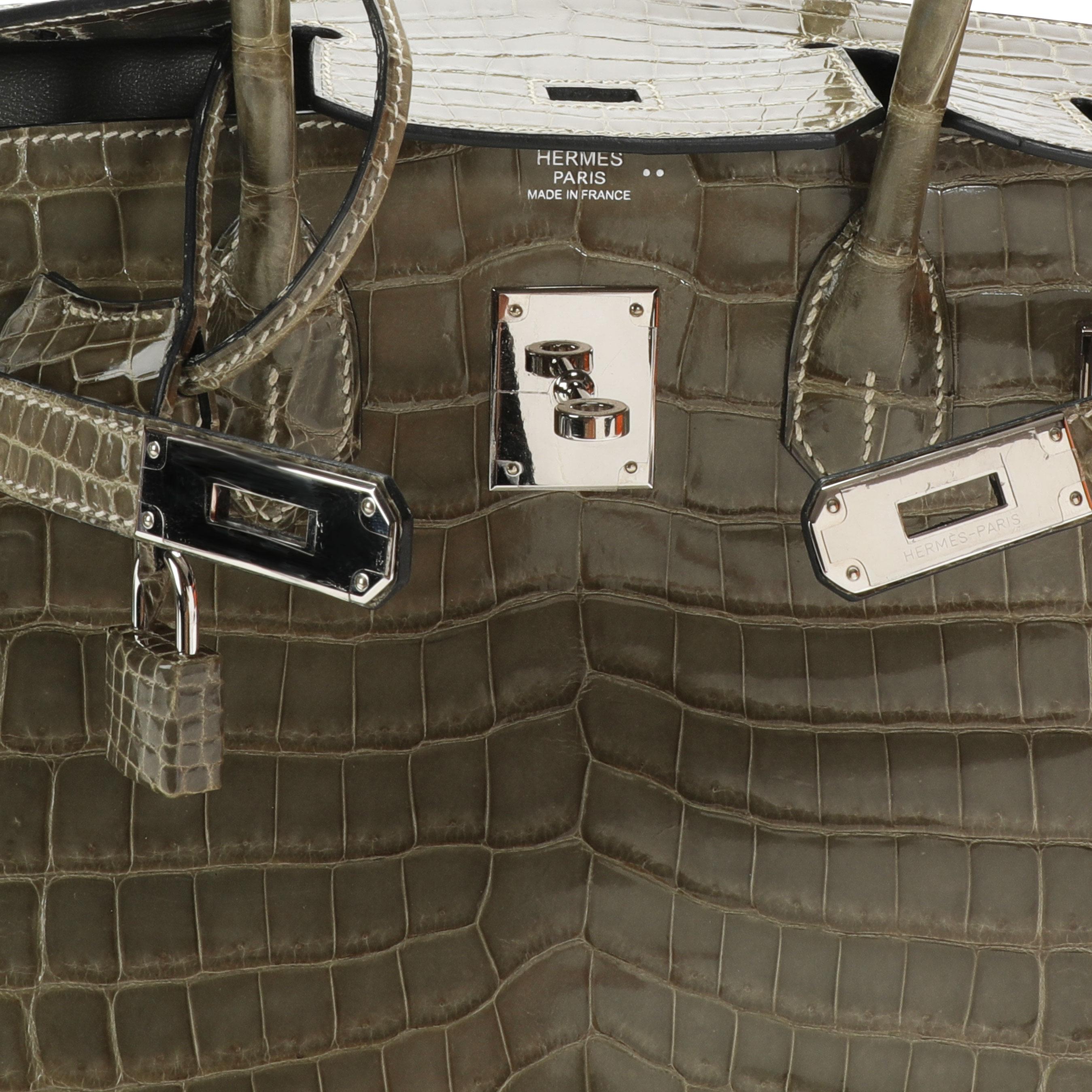 Hermès Gris Tourterelle Shiny Niloticus Crocodile Birkin 30 PHW
SKU: 110546

Handbag Condition: Excellent
Condition Comments: Excellent Condition. Plastic on most hardware.
Brand: Hermès
Model: Birkin

Origin Country: France
Handbag Silhouette: Top