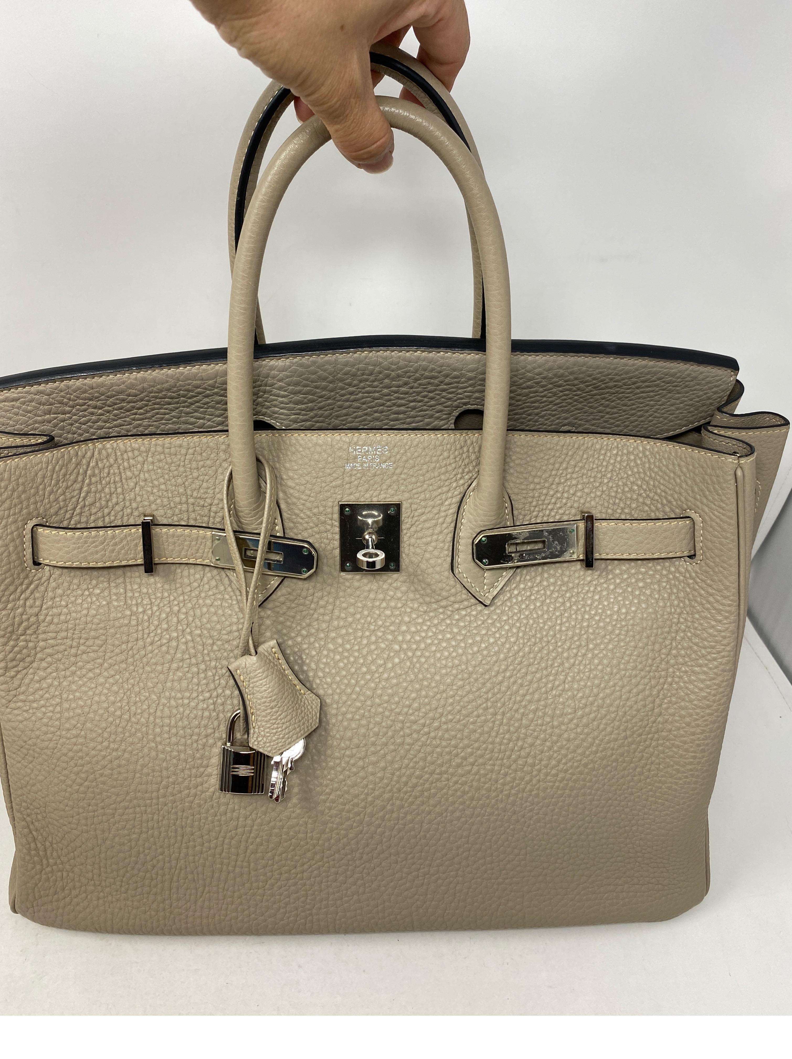 Hermes Griss Birkin 35 Bag. Togo leather. Palladium hardware. Plastic still on hardware. Excellent condition. Looks like new. Includes clochette, lock, keys, and dust cover. Guaranteed authentic. 