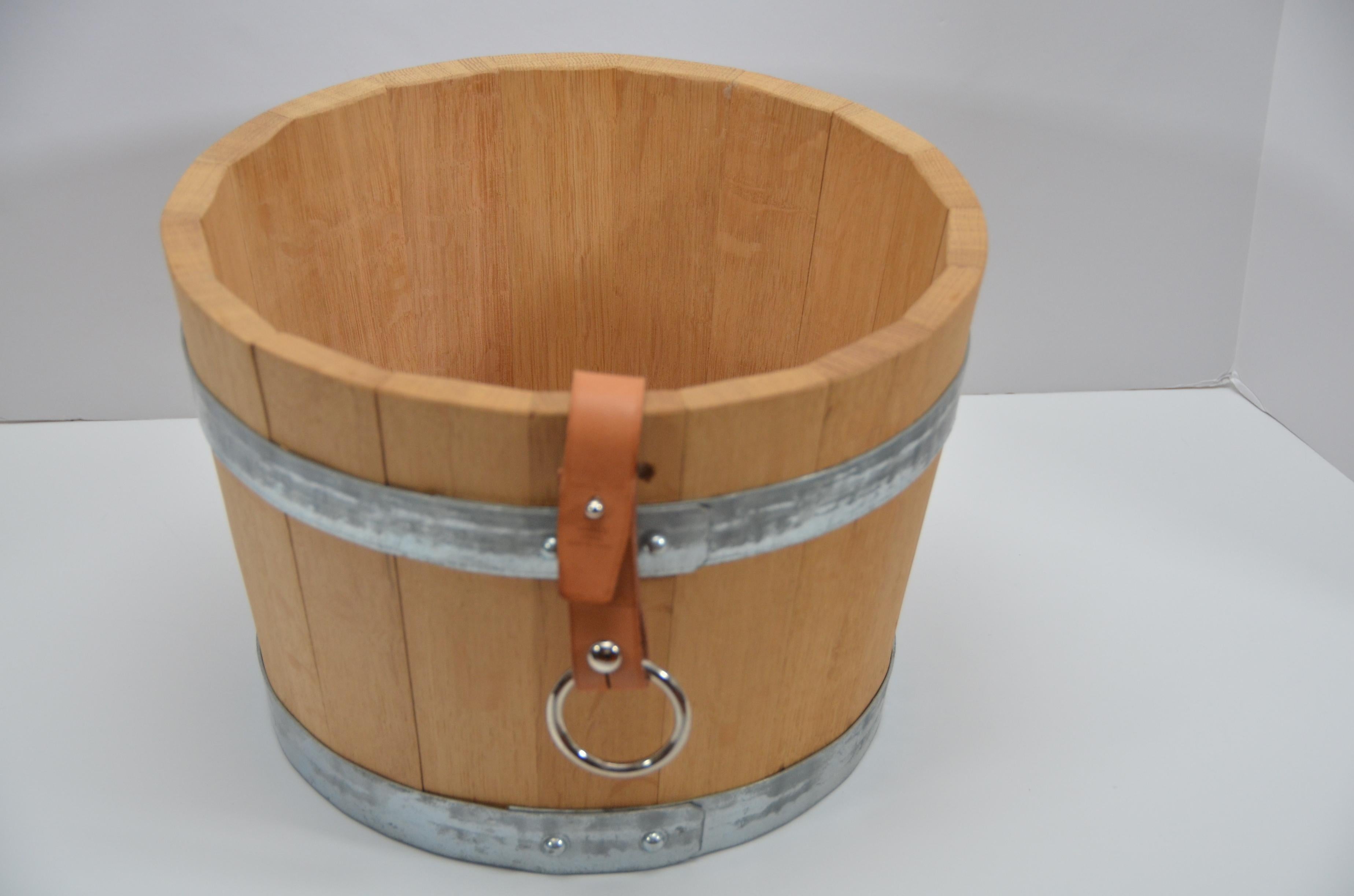 100% Guaranteed authentic Hermes equestrian grooming stable bucket features oak wood. 
Cowhide handle with stainless steel ring.  Hermes Sellier Paris signature in black. 
This equestrian piece is also a wonderful display piece in the home! 
No