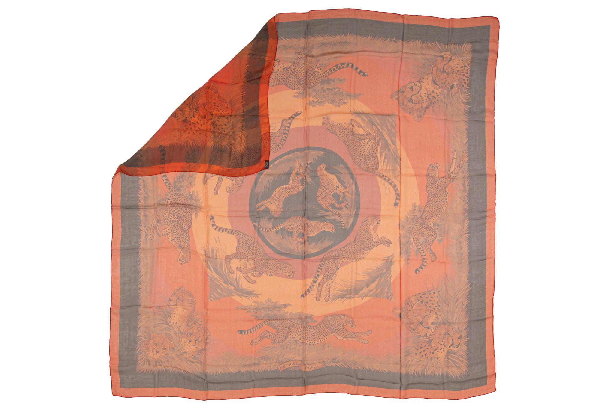 Hermès orange silk chiffon “Guepards” shawl by Dallet. Excellent condition, hand rolled edges.