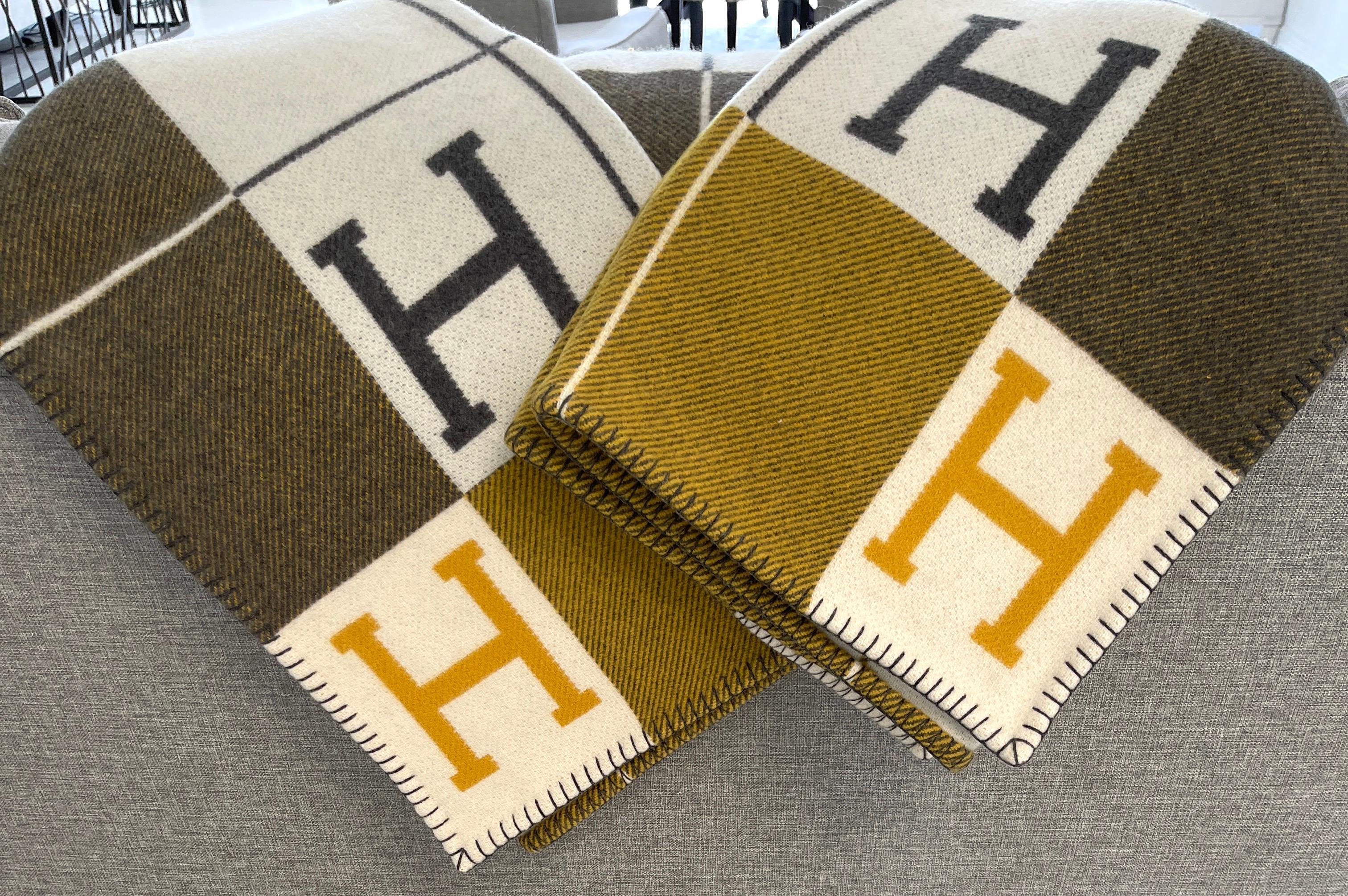 Hermes Avalon III Blanket
Gris and Soleil
New color combination
Grey and Yellow

Brand New
Taken out for photos only
Hermes throw blanket (90% merino wool, 10% cashmere)
Measures 53