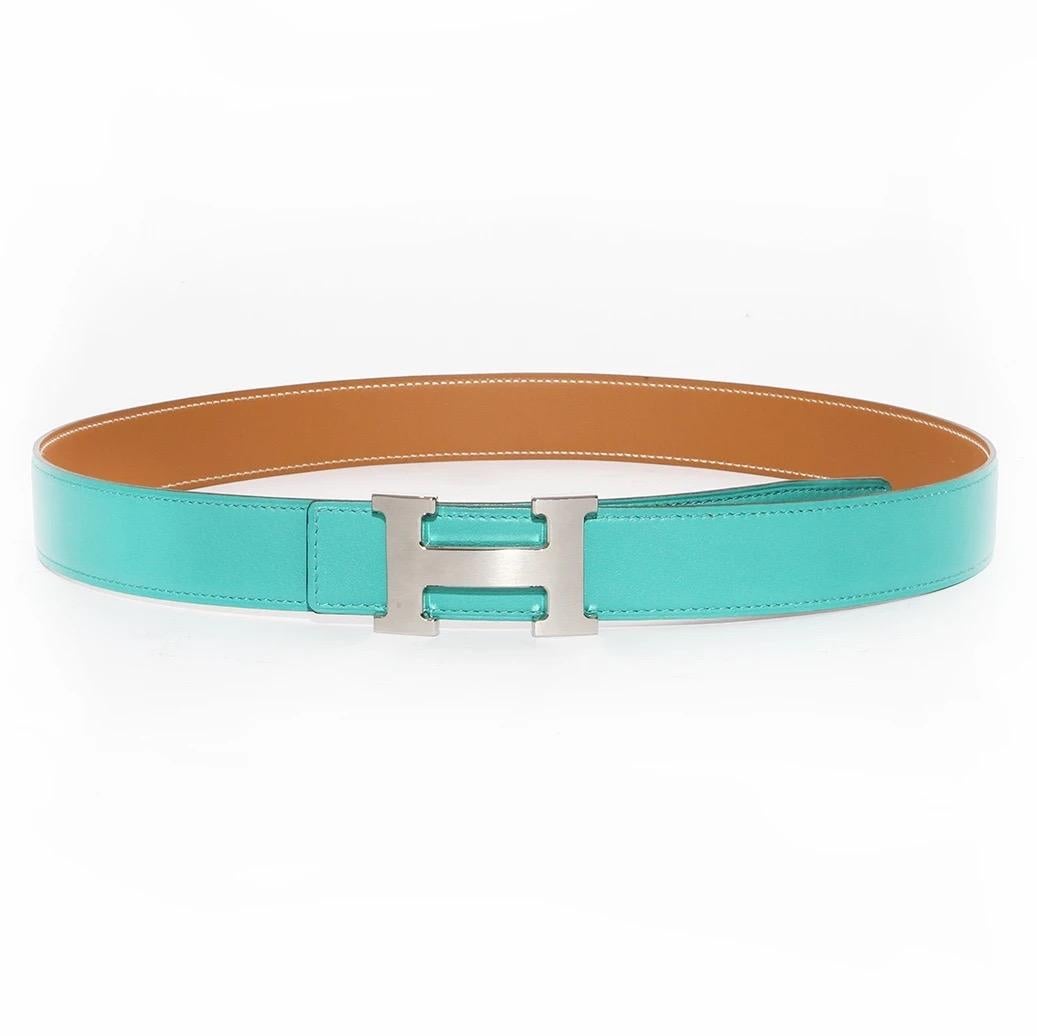 Hermés H Belt 
Made in France 
Reversible 
One side is Teal
One side is cappuccino brown
Silver paladin plated H buckle
Buckle is detachable 
3 punch holes
Stamped 85cm Length
Stamped Hermés Paris Made in France on brown side of belt 
Excellent