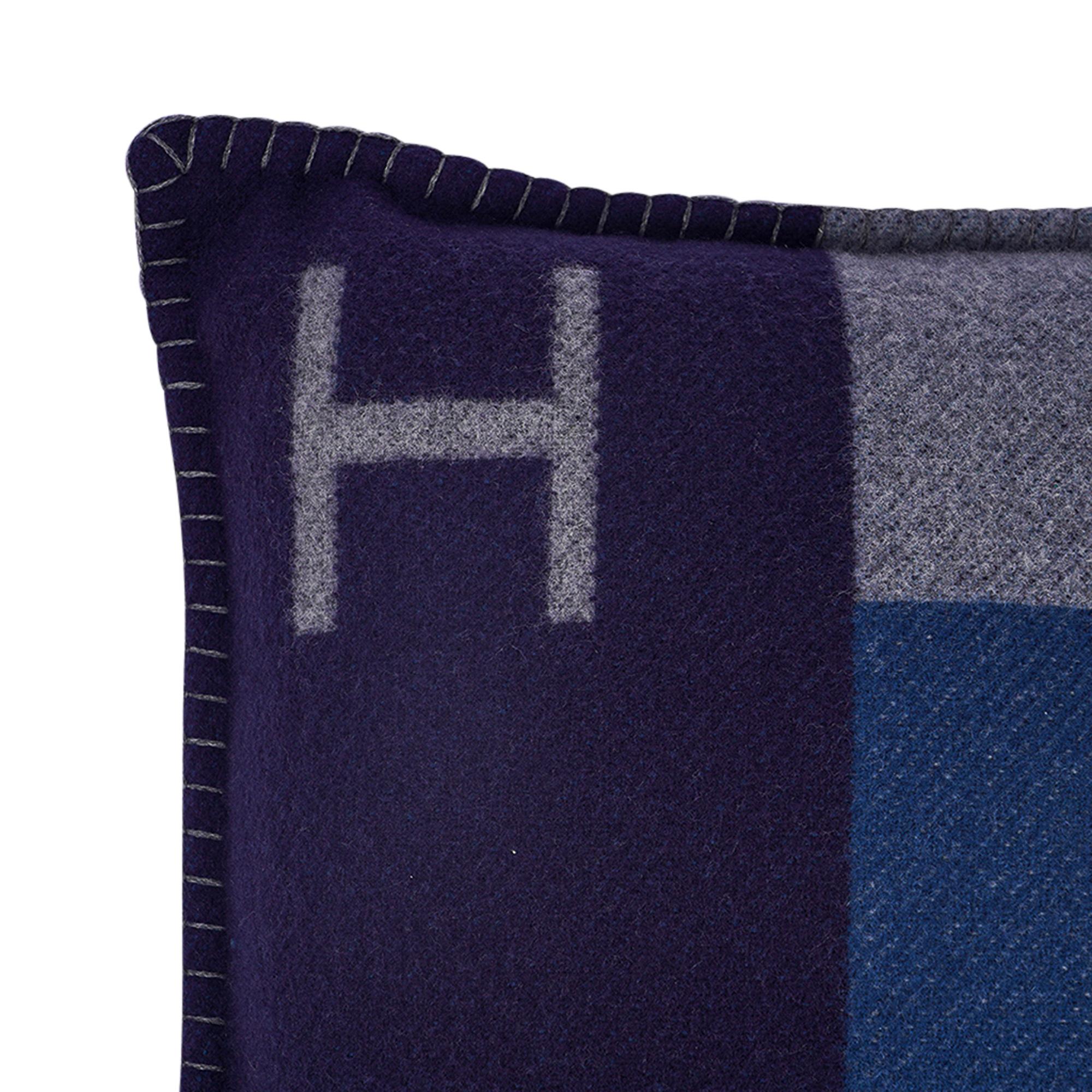 Mightychic offers an Hermes Casaque H Pillow featured in Marine and Acier.
A modern expression of the classic H pillow inspired by the horse racing world.
Originally featured on silk jerseys these prints are created for the home.
Hidden zip.
90%