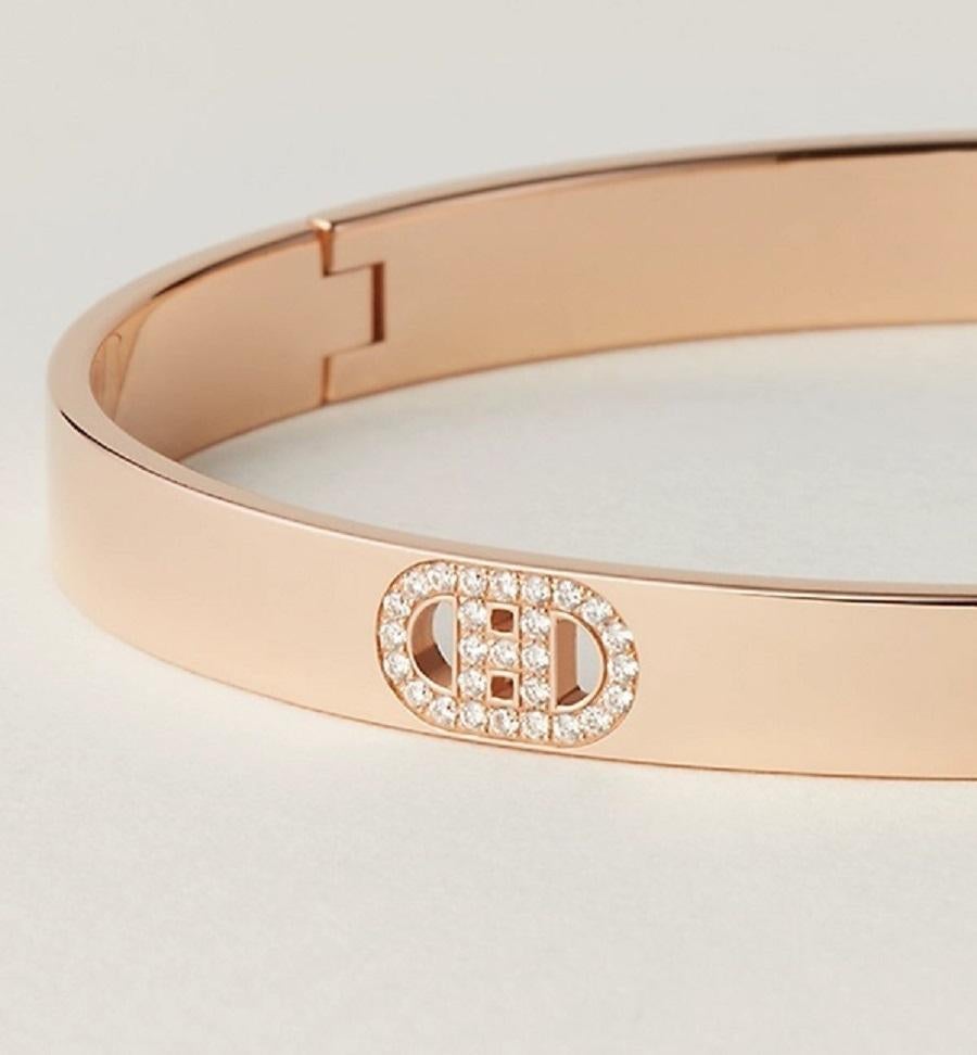 Size SH
Bracelet in rose gold set with 27 diamonds

A mesh of Hermès symbols: placed on a lightweight bangle, the 