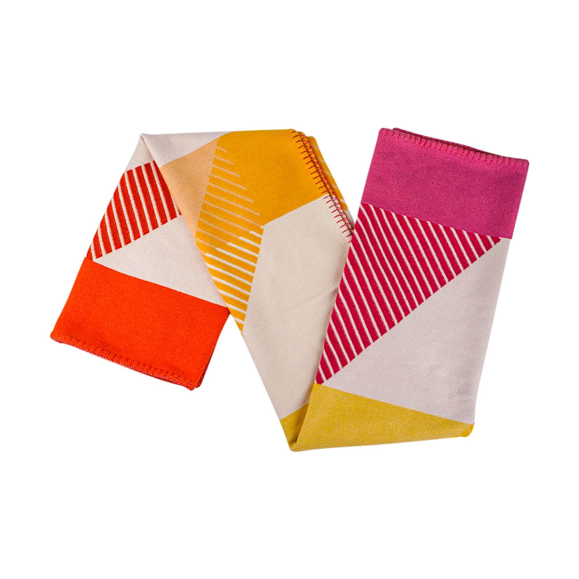 Mightychic offers an Hermes H Diagonale blanket featured in Petunia and Mandarine.
Inspired by a 1929 Hermes advertisement for male and female accessories.
The name H Diagonal comes from the Art Deco style of the ads original graphic design.
This