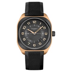Hermes H08 La Matiere du Temps Montre or rose bracelet caoutchouc noir 42 mm