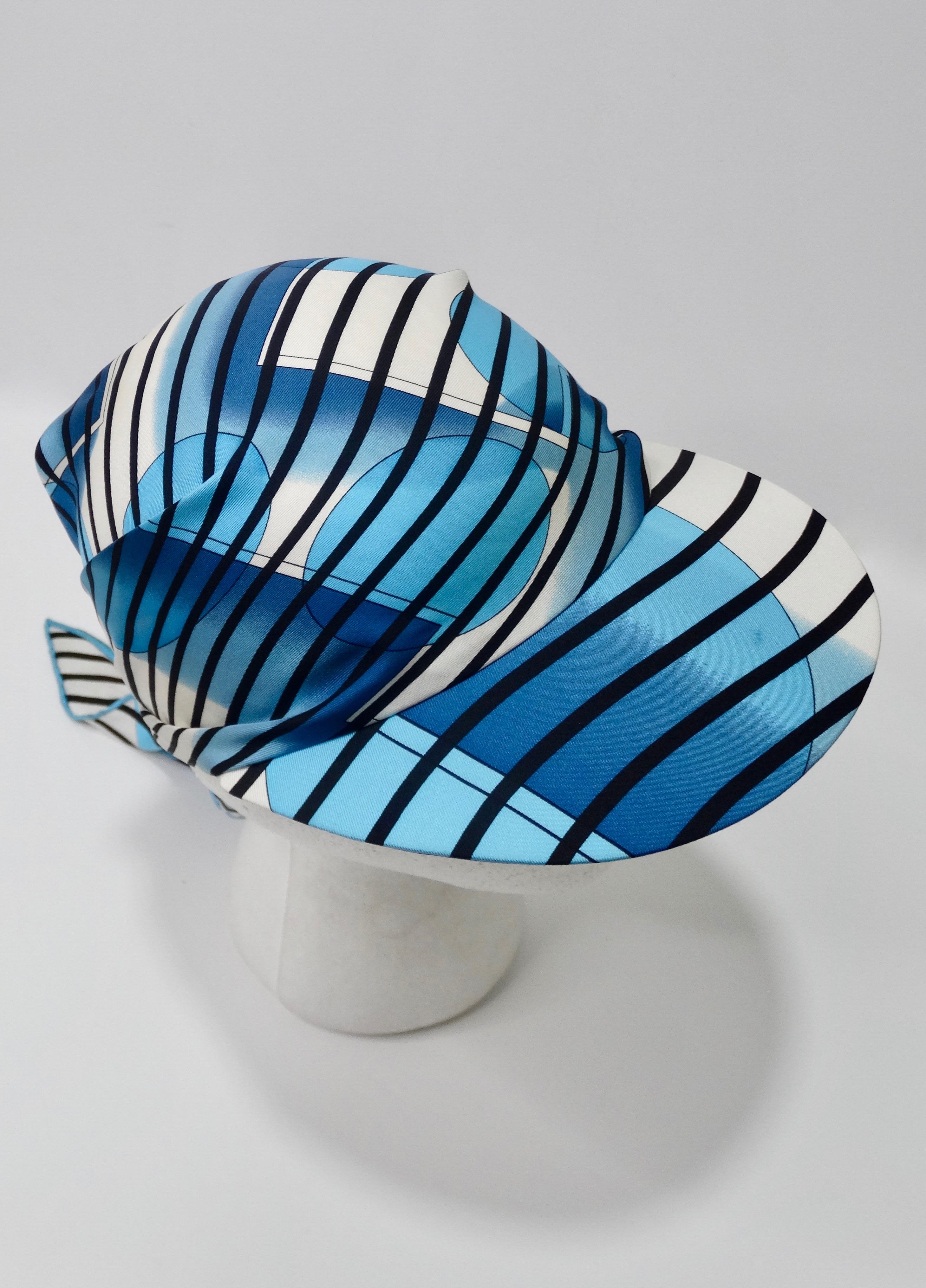 Relax by the beach or pool in style with this adorable Hermes scarf cap! Designed by Bali Barret for Hermes circa 2005, the scarf displays bold black stripes, aqua bubbles and a large H with a 