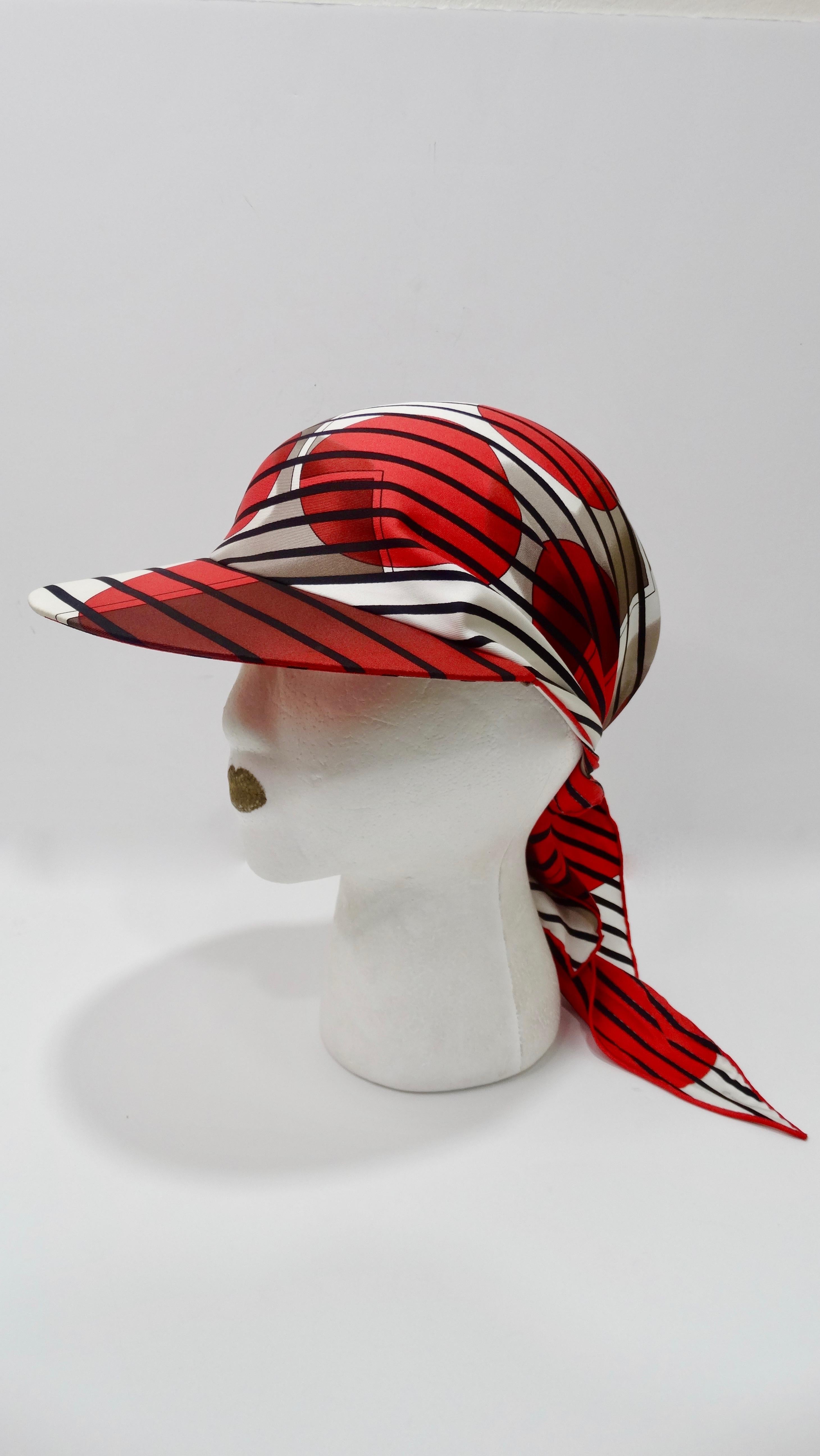 Relax by the beach or pool in style with this adorable Hermes scarf cap! Designed by Bali Barret for Hermes circa 2005, the scarf displays bold black stripes, vibrant red bubbles and a large H with a 