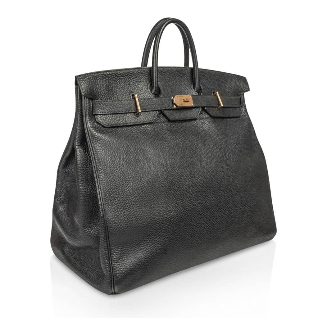 Mightychic offers a rare 50 Hermes Hac (Sac Haut a Courroies) featured in Black Fjord leather.  
Limited edition accentuated by brass hardware.
Chic and timeless.   
This beautiful travel bag is a true Hermes collectors treasure.
Comes with lock,