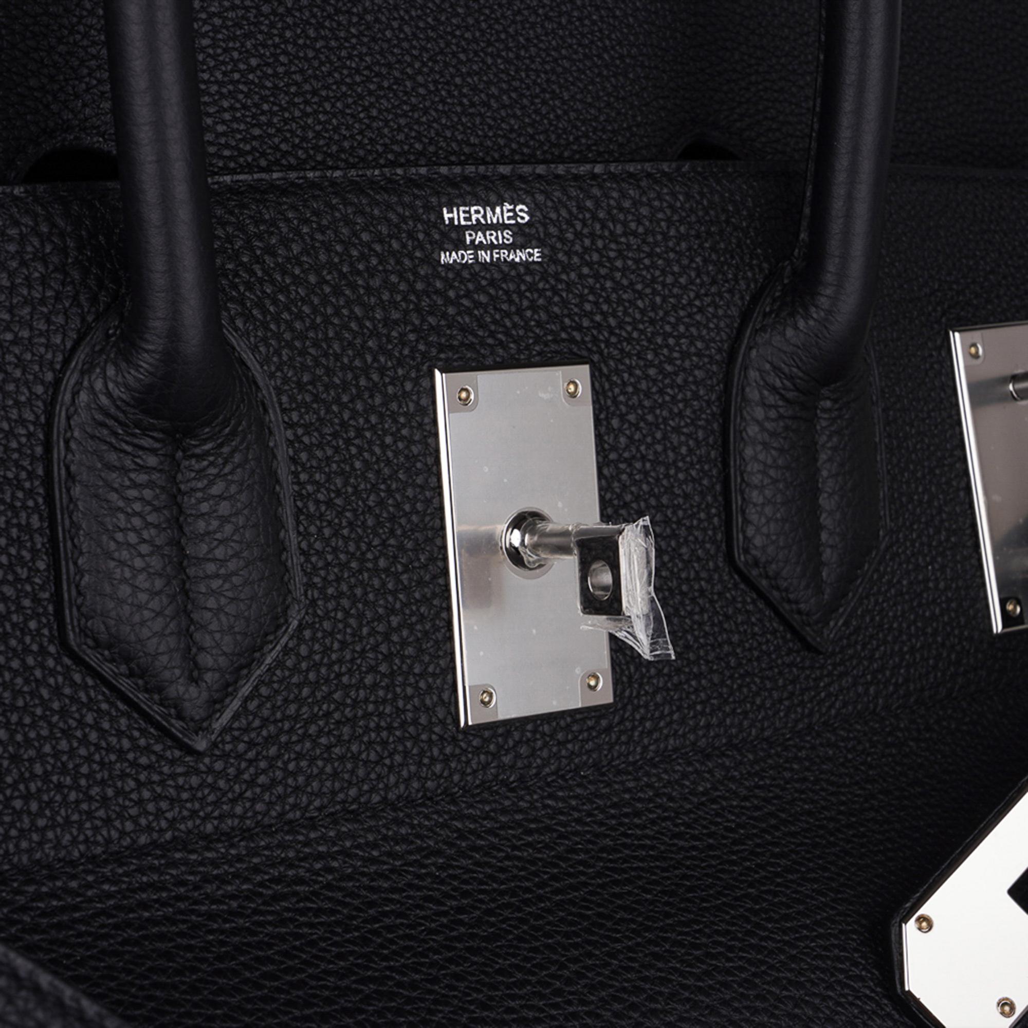 Mightychic offers an Hermes 50 Sac HAC (Haut a Courroies) Birkin bag featured in  Black..  
Togo leather is scratch resistant and is accentuated with Palladium hardware.
Chic and timeless.   
This beautiful travel bag is a true Hermes collectors