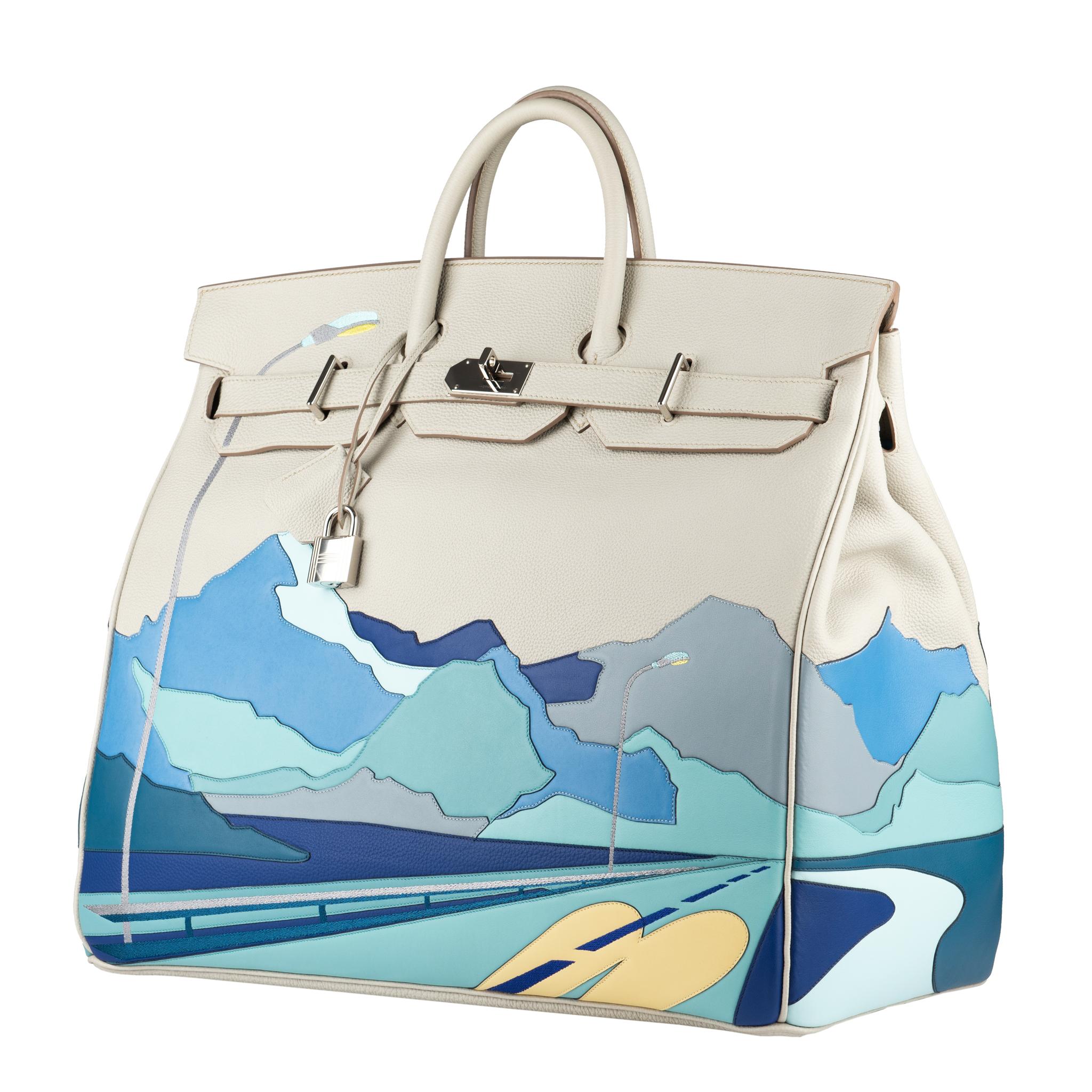 1stdibs Exclusives From Three Over Six

Brand: Hermès 
Size: Haut à Courroies 50cm “Endless Roads”
Color: Gris Perle and multi-tone patchwork leather with silver-tone embroidery
Leather: Togo and Swift
Hardware: Palladium  
Stamp: 2020 D
Condition: