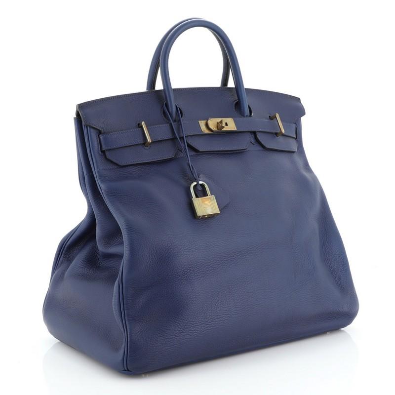 Condition: Fair. Heavy loss of shape on exterior, cracking on handles and opening corners wax edges. Indentations and minor scuffs in interior, scratches and tarnish on hardware. 
Accessories: Keys, Lock, Clochette 
Measurements: Handle Drop 4.5