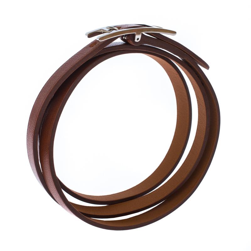 This Hermes Hapi 3 wrap bracelet is a smart accessory that can be paired well with your casual looks. Made from leather in a brown shade, it is accented with a palladium-plated buckle sculpted in the shape of the iconic 'H'. The bracelet has a long