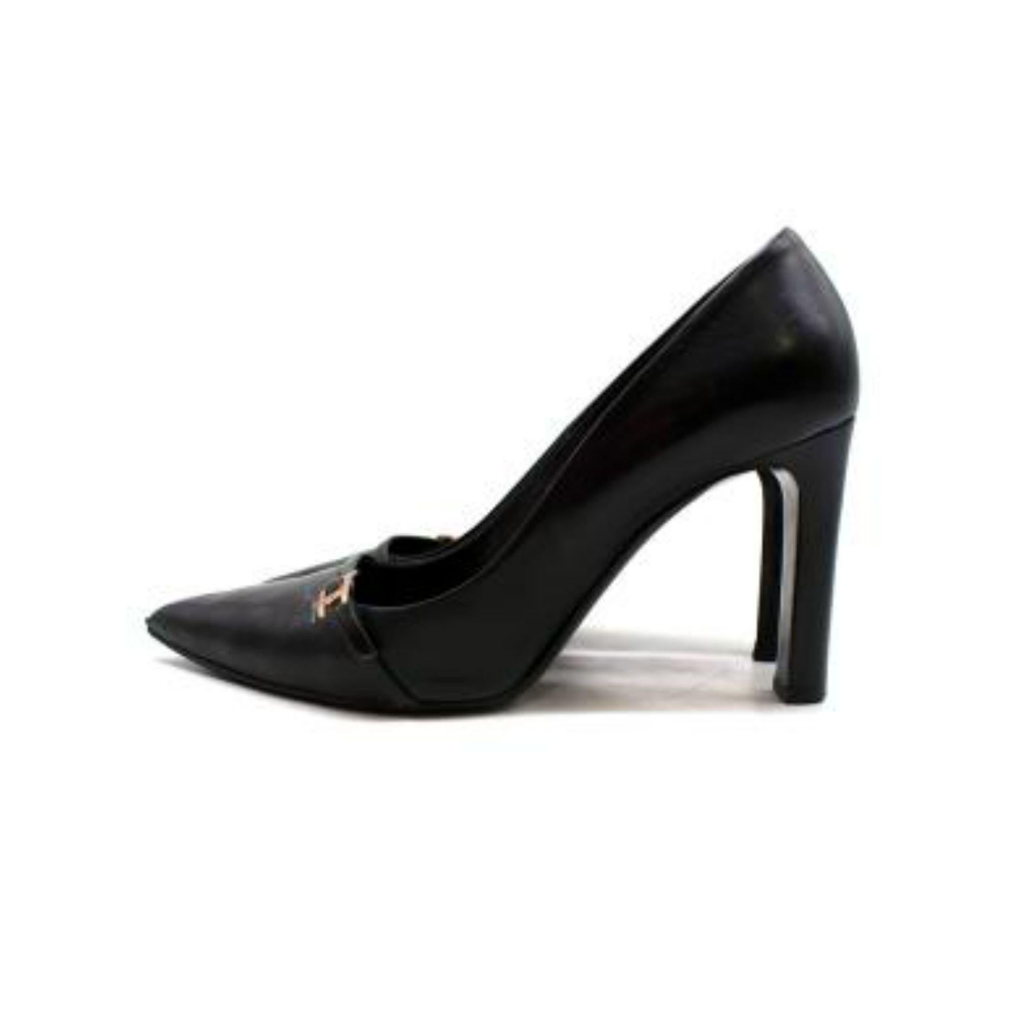 Hermes Hapi Buckle Black Leather Point Toe Pumps

- Pointed toes
- Buckle detailing
- Black leather body
- Branded and leathered insoles

Material
Leather

Made in Italy

9.5/10 Excellent condition

PLEASE NOTE, THESE ITEMS ARE PRE-OWNED AND MAY