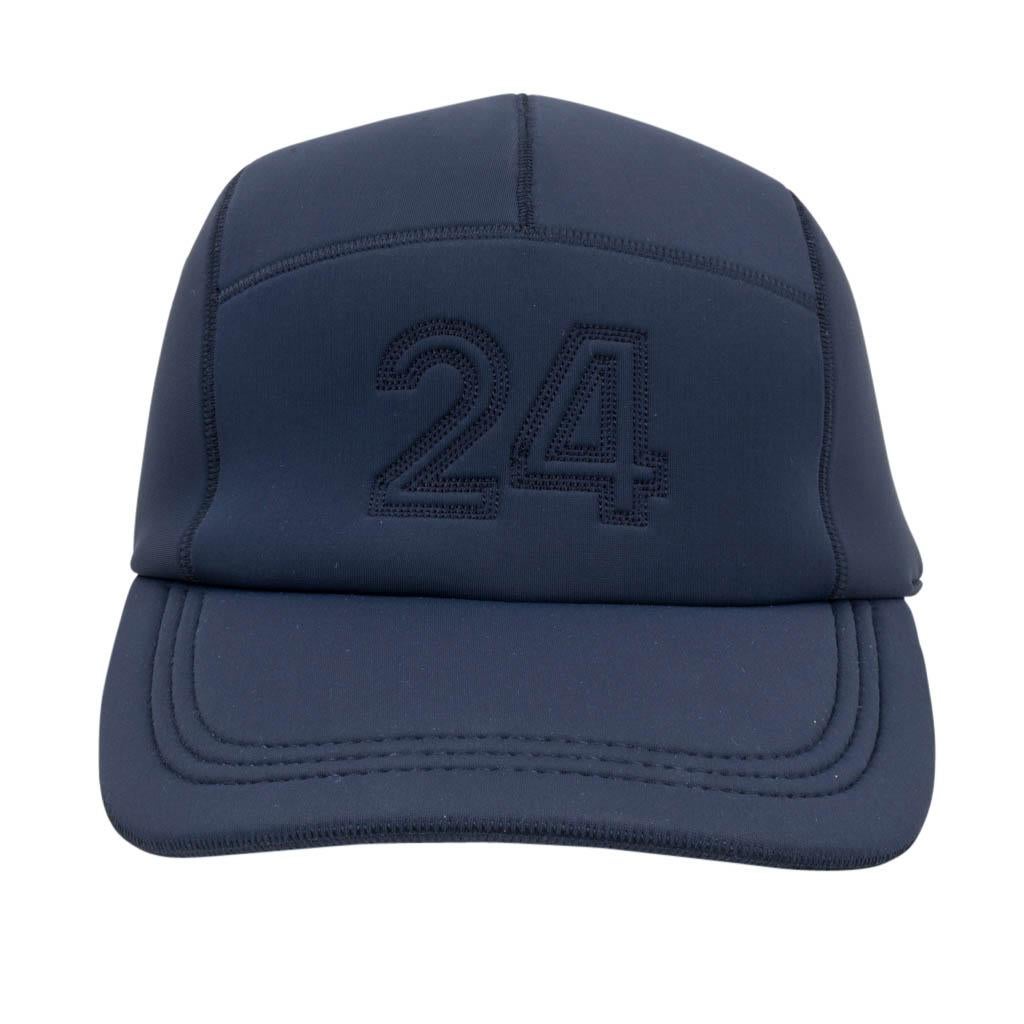 Hermes Nevada 24 cap features Marine neoprene. 
24 is embroidered on the front and HERMES on the side. 
Striped elastic rear. 
NEW or NEVER WORN 
final sale

HAT SIZE:
M  

CONDITION:
NEW or NEVER WORN
