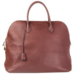 HERMÈS Sac de voyage BOLIDE 45 en cuir clémence marron havane