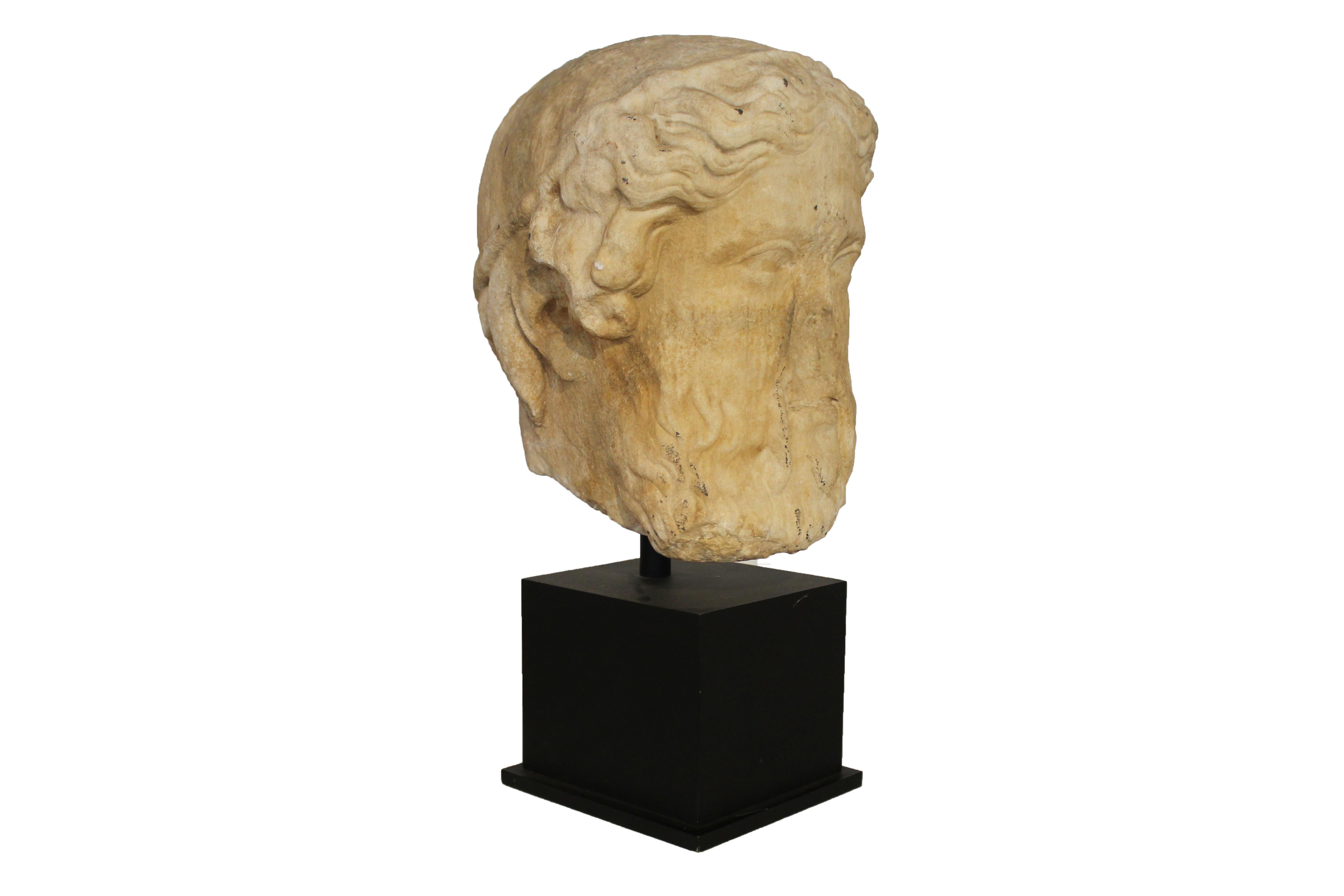 Hermes head sculpture.
Greek Bust representing Hermes.
Hermes is an Olympian deity, the God of Speed, in ancient Greek religion and mythology.
Sculpted white marble with a metal base.
Provenance: Galeria F. Cervera (Arqueologia - Ancient