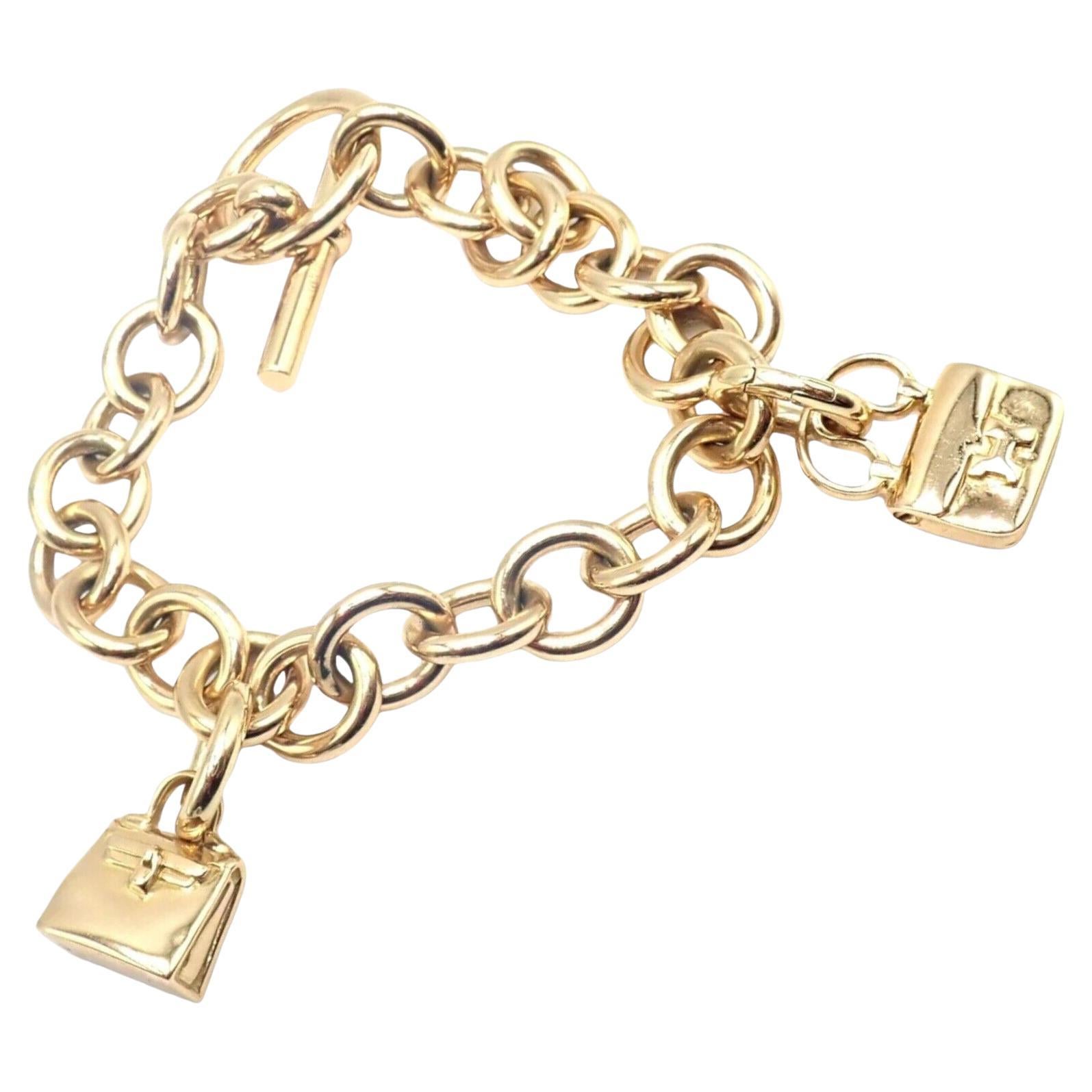Hermes Heavy Link Toggle With Two Hanging Bag Charms Yellow Gold Bracelet For Sale