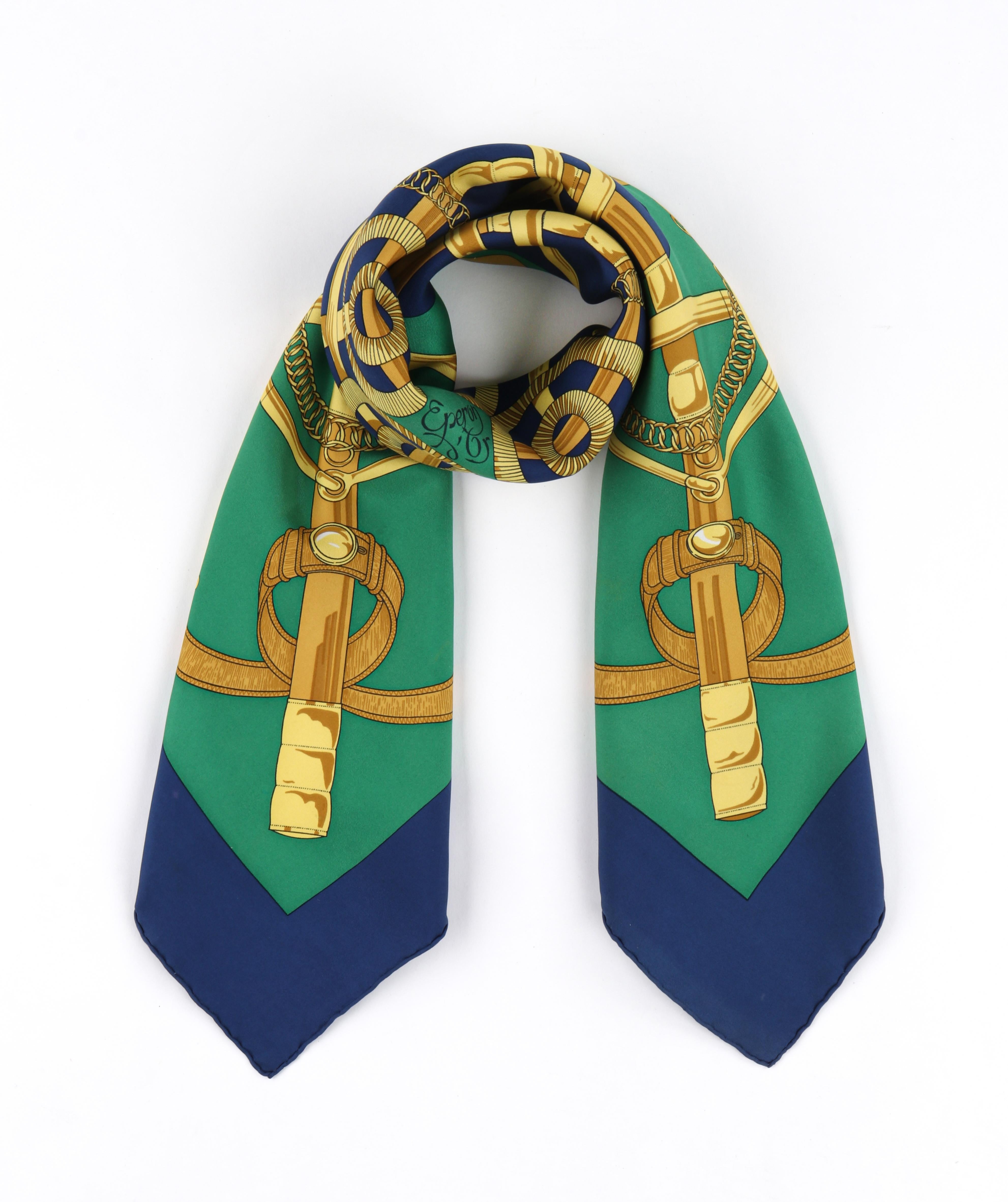 HERMES Henri d’Origny “Eperon D’or” Green Blue Gold Equestrian Large Silk Scarf
 
Brand/Manufacturer: Hermes
Designer: Henri d’Origny
Style: Large Silk Scarf
Color(s): Shades of blue, gold, green
Lined: No
Unmarked Fabric Content (feel of): Silk