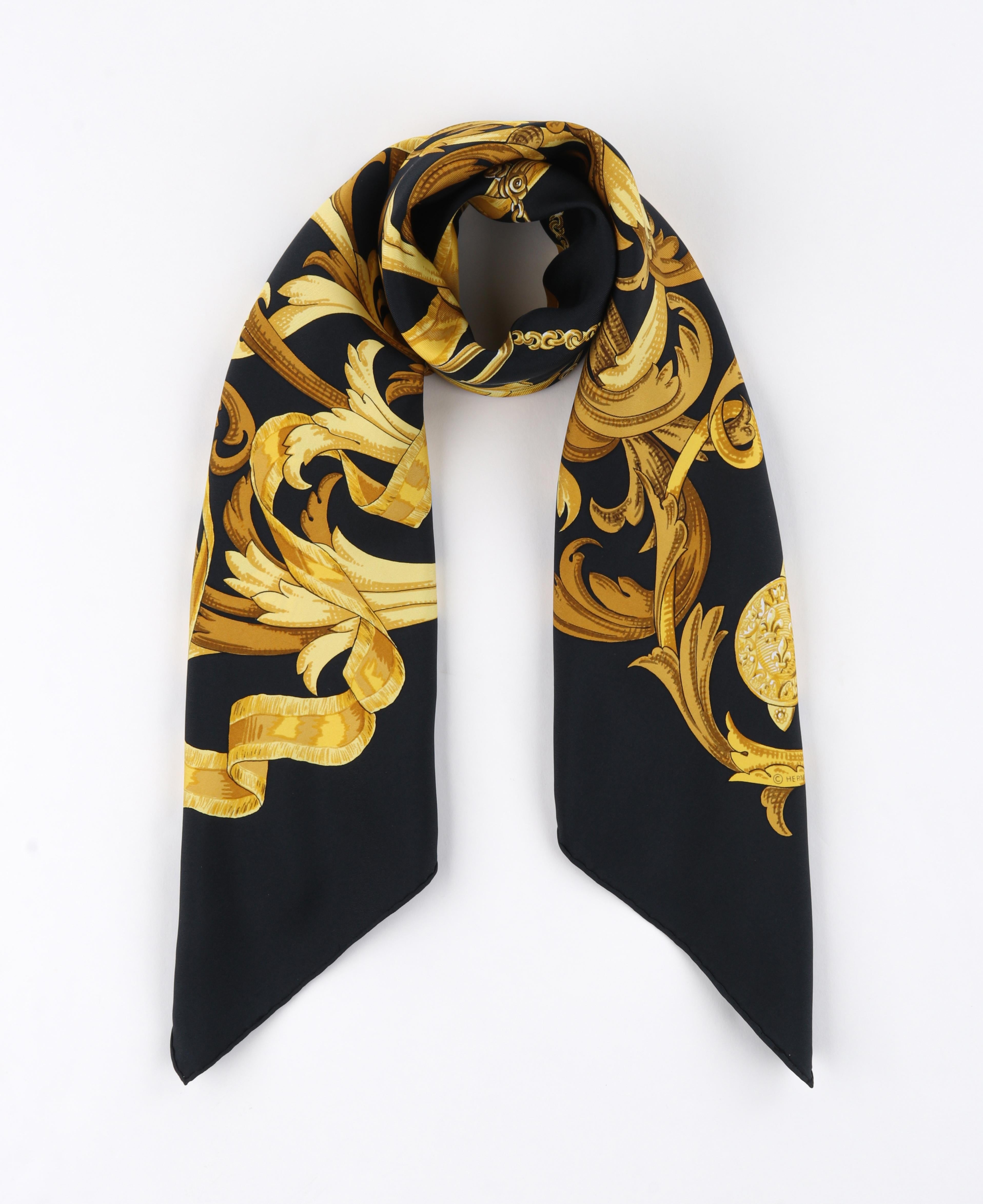 HERMES Henri D’Origny “Le Mors A La Conetable” Dark Blue Gold Equestrian Print Scarf
 
Brand/Manufacturer: Hermes
Circa: 1970/1990 Reissue
Designer: Henri D’Origny 
Style: Square scarf
Color(s): Shades of blue, yellow, brown, gold
Lined: No
Unmarked