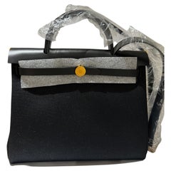 Hermes Herbag 31 Bolso negro con herrajes dorados