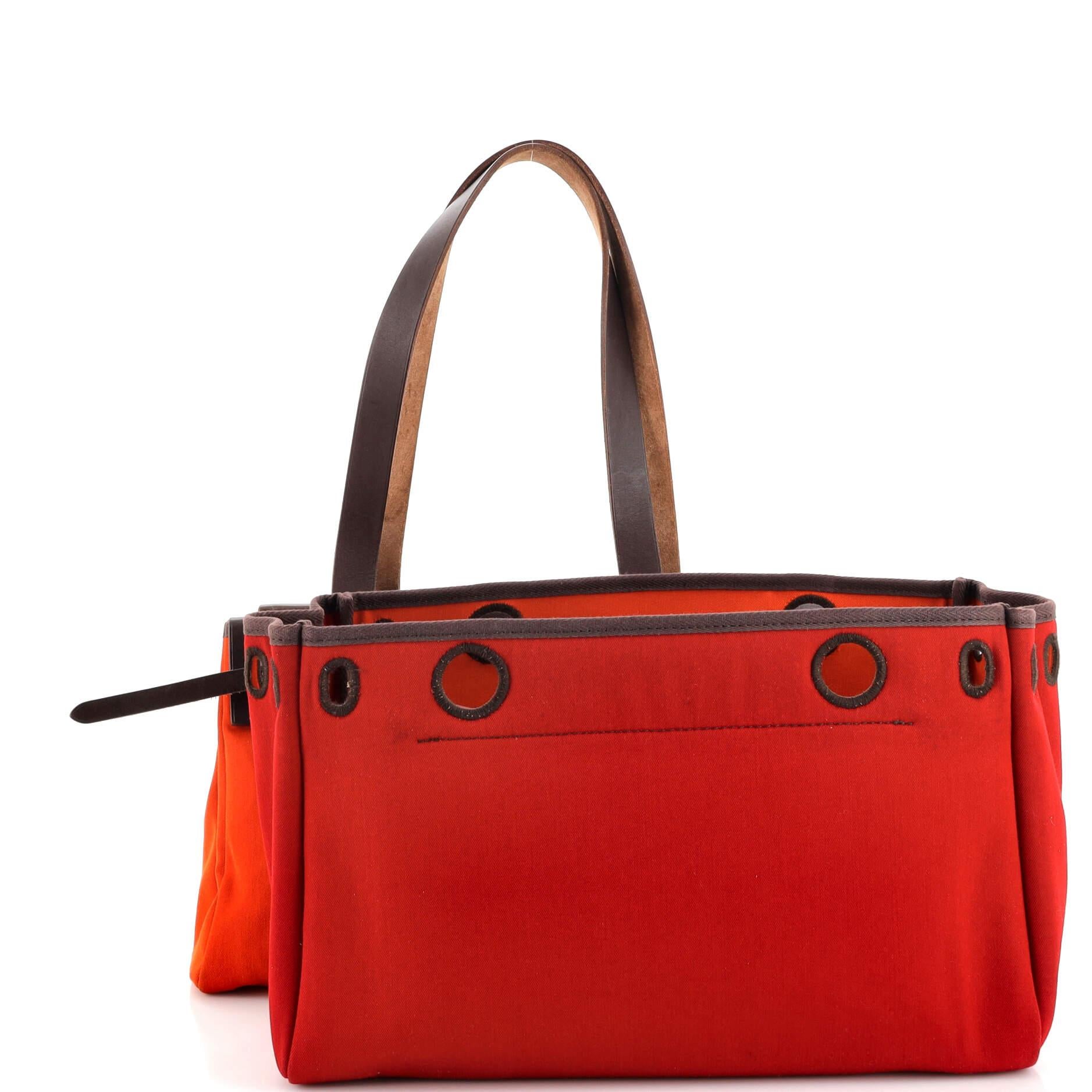 Condition: Fair. Creasing, moderate wear and darkening on exterior and in interior, heavy wear and scuffs on leather trims and handles. Water stains underneath handles, scratches on hardware.
Accessories: Extra Bag
Measurements: Handle Drop 9