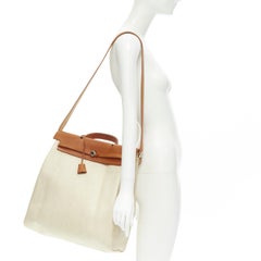 Bolso HERMES Herbag MM de lona revestida de Toile beige y piel marrón PHW 2 en 1
