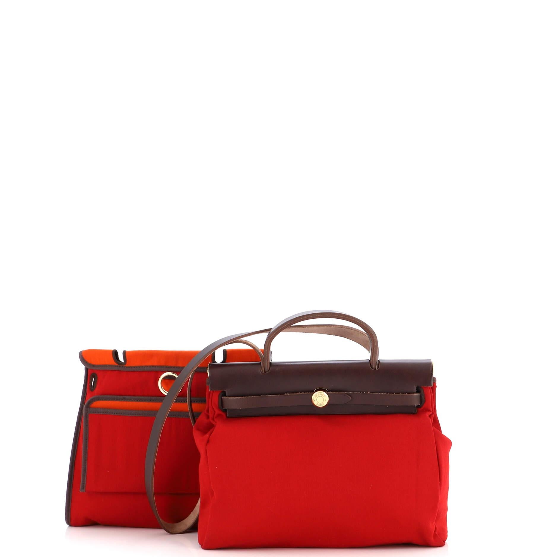 Sold at Auction: HERMES CHANGEABLE 'HERBAG PM' IN TWO SIZES