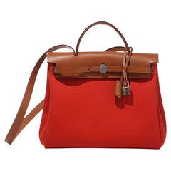 Hermès Herbag Reißverschluss 31 Fauve Vache und Orange Mecano Toile PM Palladium-Hardware