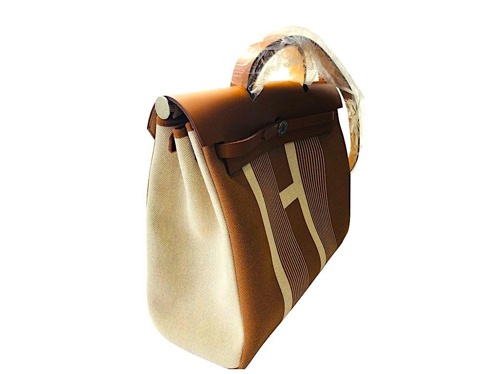 Absolutely gorgeous Limited Edition Hermes Herbag Zip 39 Retourne Toile Plume H Vibration/Hunter for sale. These are so difficult to find and only few made. The colour is Ecru-Beige and is Brand New, Year 2020. Grab this exclusive piece knowing that