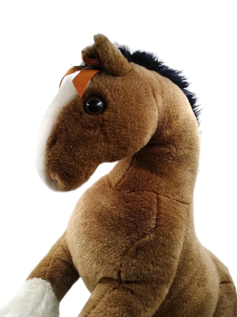 Hermes Hermy The Horse Large Plush Toy
100% authentic Hermes
The outside is 100% acrylic, while the inside is 100% polyester, as shown on the label. 
The total length of the plush is 63 cm, unobtainable in this size.
The horse's hair, in brown
