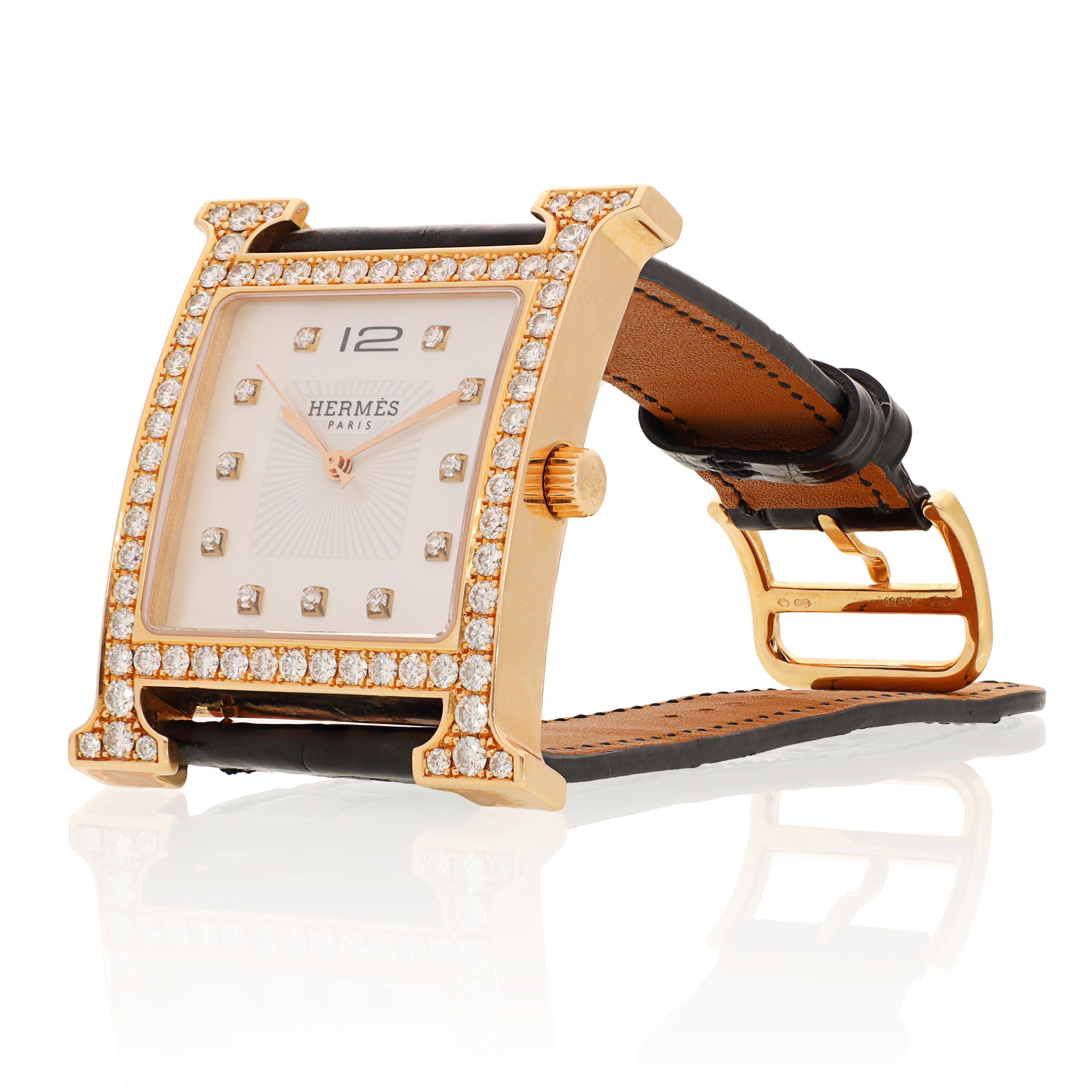 Basic Info
Brand - Hermes
Model - Heure H - Diamond Bezel - Diamond Markers
Case material - 18K Rose Gold
Movement - Quartz
Bracelet material - Black Alligator
