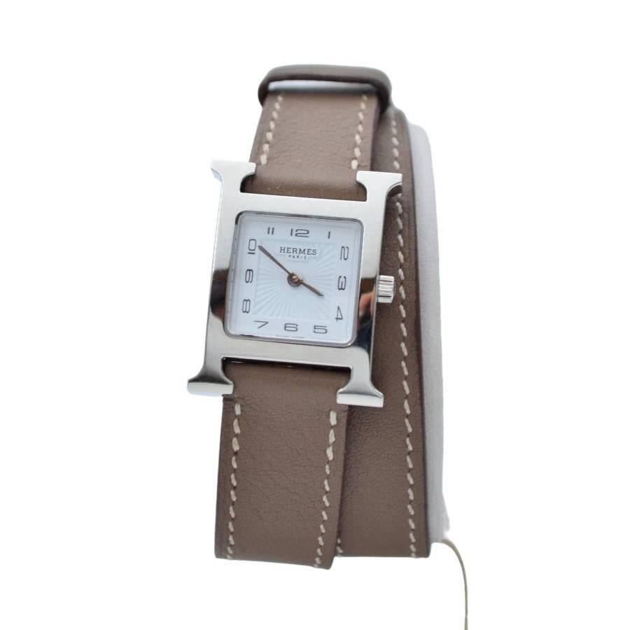 The watch is in a very good condition and it’s working well. It shows slight signs of wear and scratches. The watch comes with an AGS Jewelry wooden box, along with an AGS Jewelry warranty card. For more information about delivery, warranty and