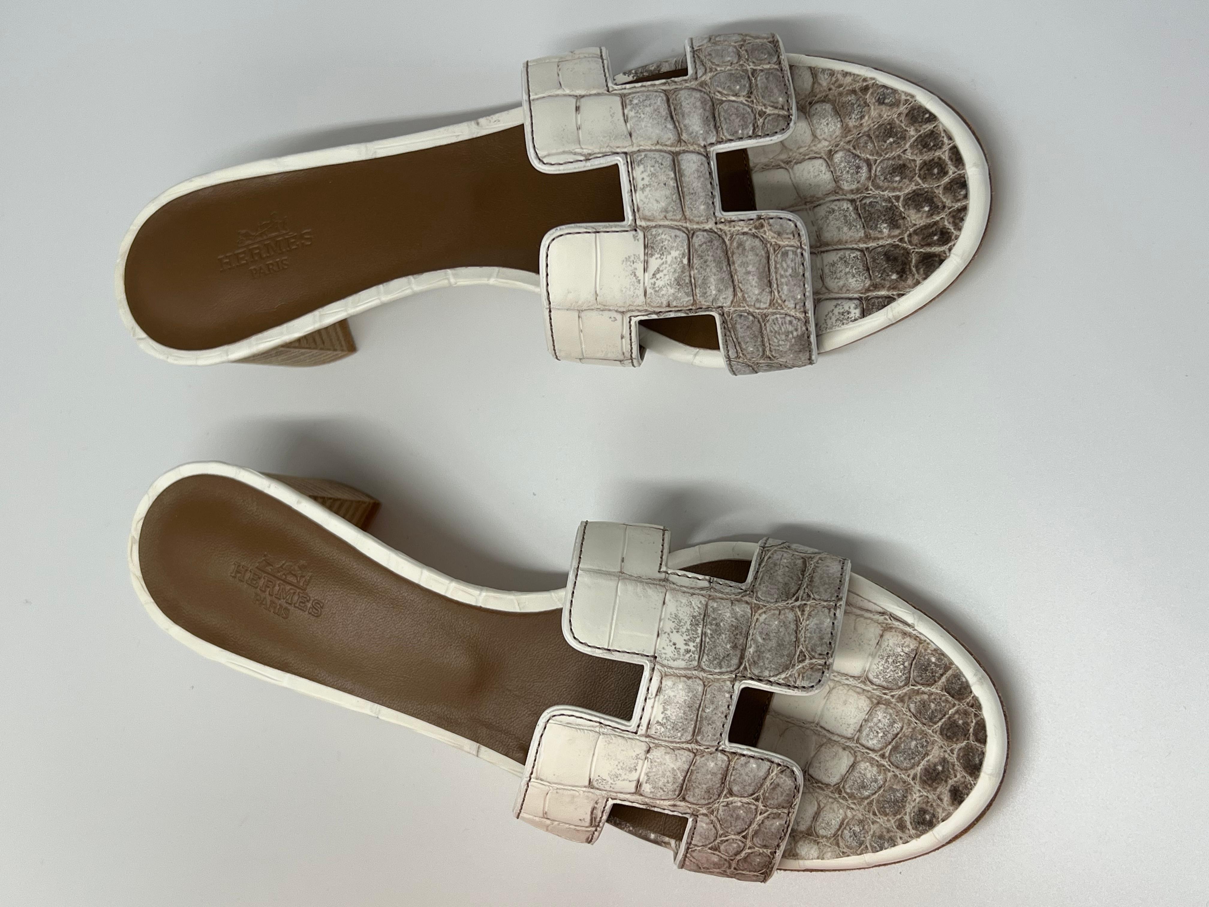 Includes invoice, box, dustbag and Cites
Made in France
Brand New Himalayan Crocodile Oran Sandals full set with CITES
These beautifully crafted sandals are crafted to mimic the snowy peaks of the Himalayan mountains.
 Hermes collectors item.
 Year