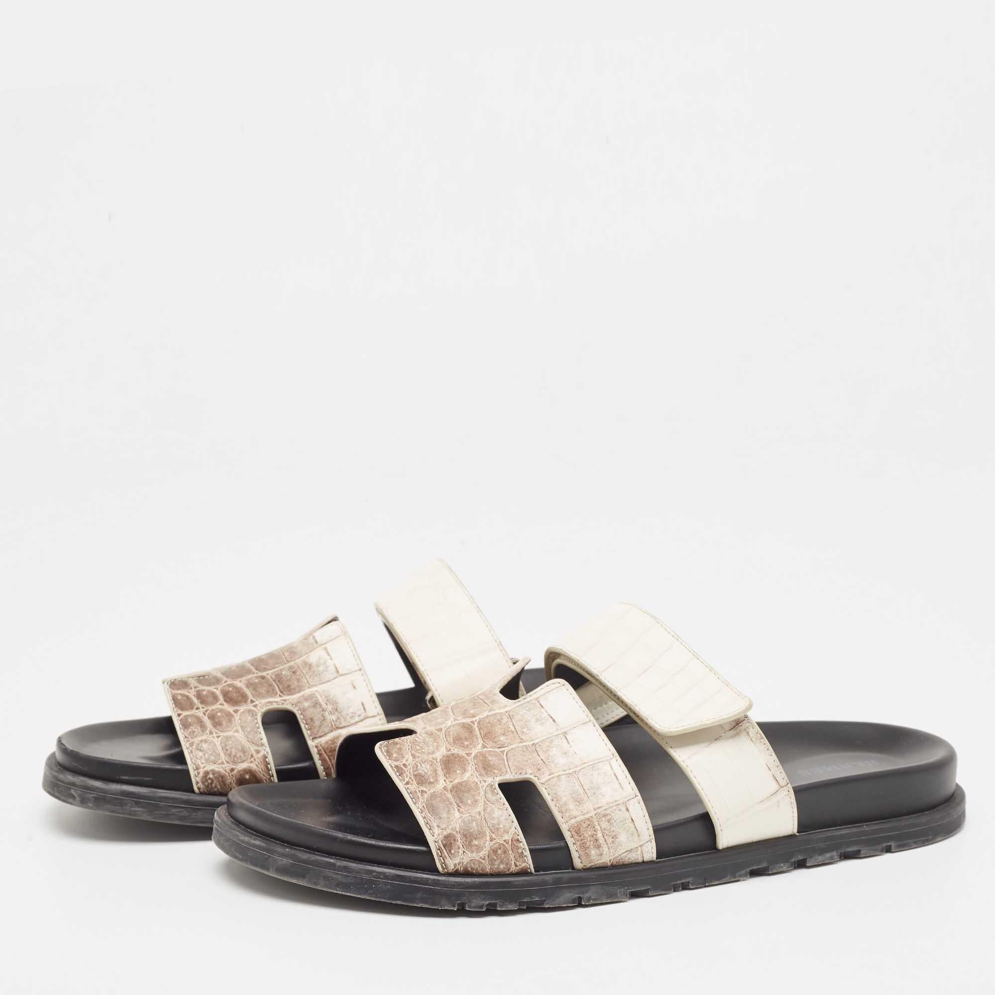 The Hermes Chypre sandal for men is a luxurious definition of casual urban style. The flats have the signature H strap and a single adjustable strap on the upper, and the soles are finished in rubber. The sleek design is meant to look great on your