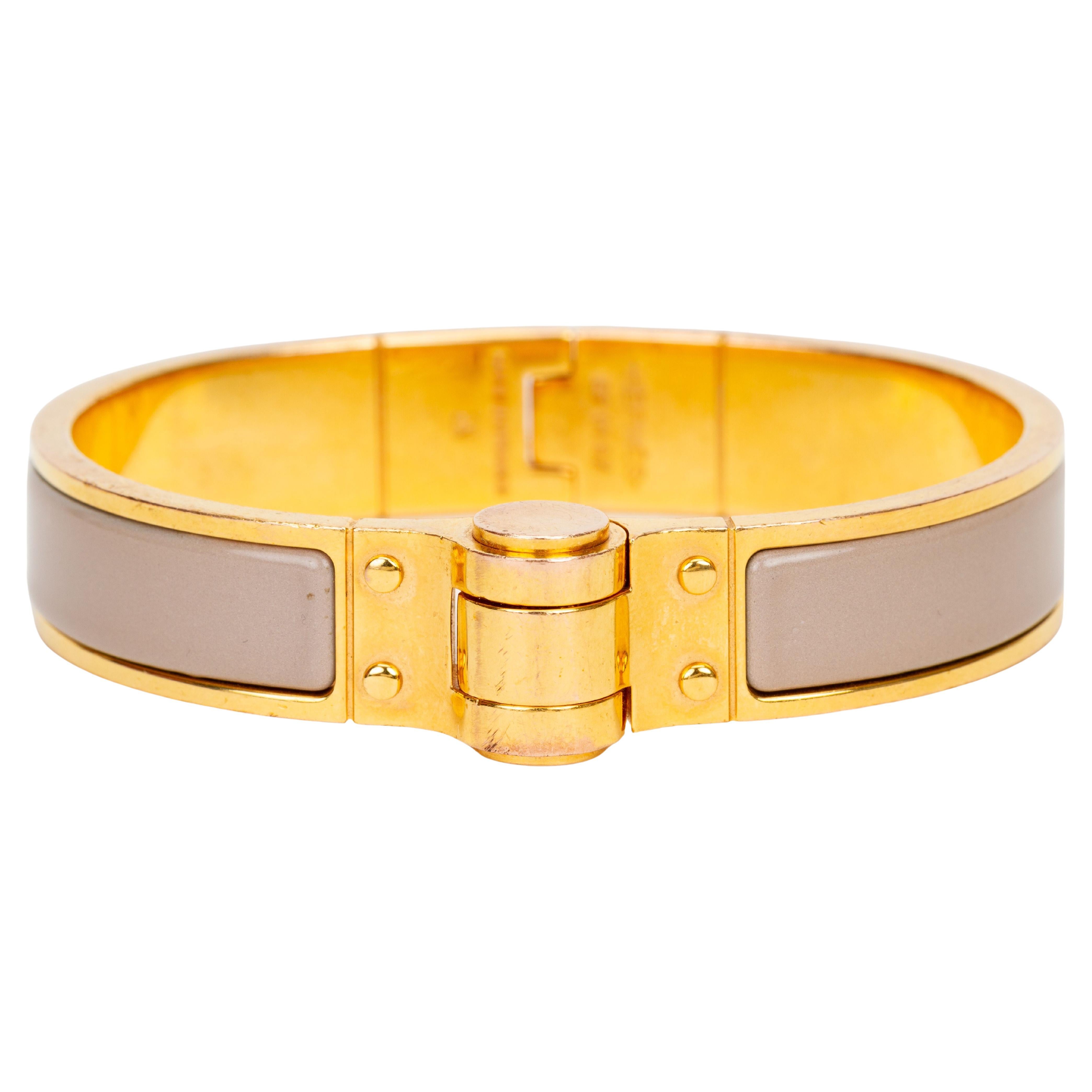 How do I open my Hermès H bracelet?