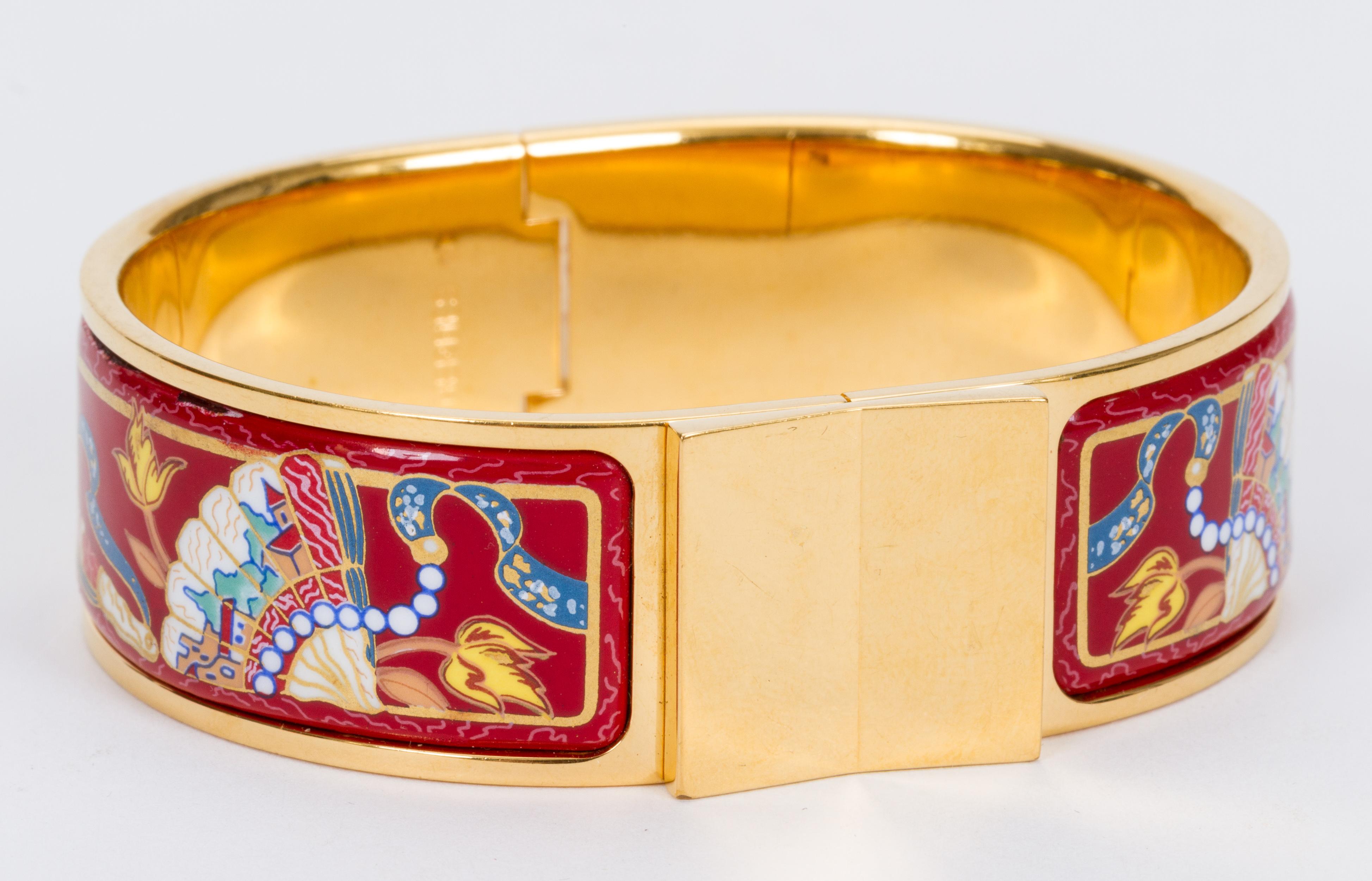 Hermès red and gold enamel hinged cuff. Interior, 8