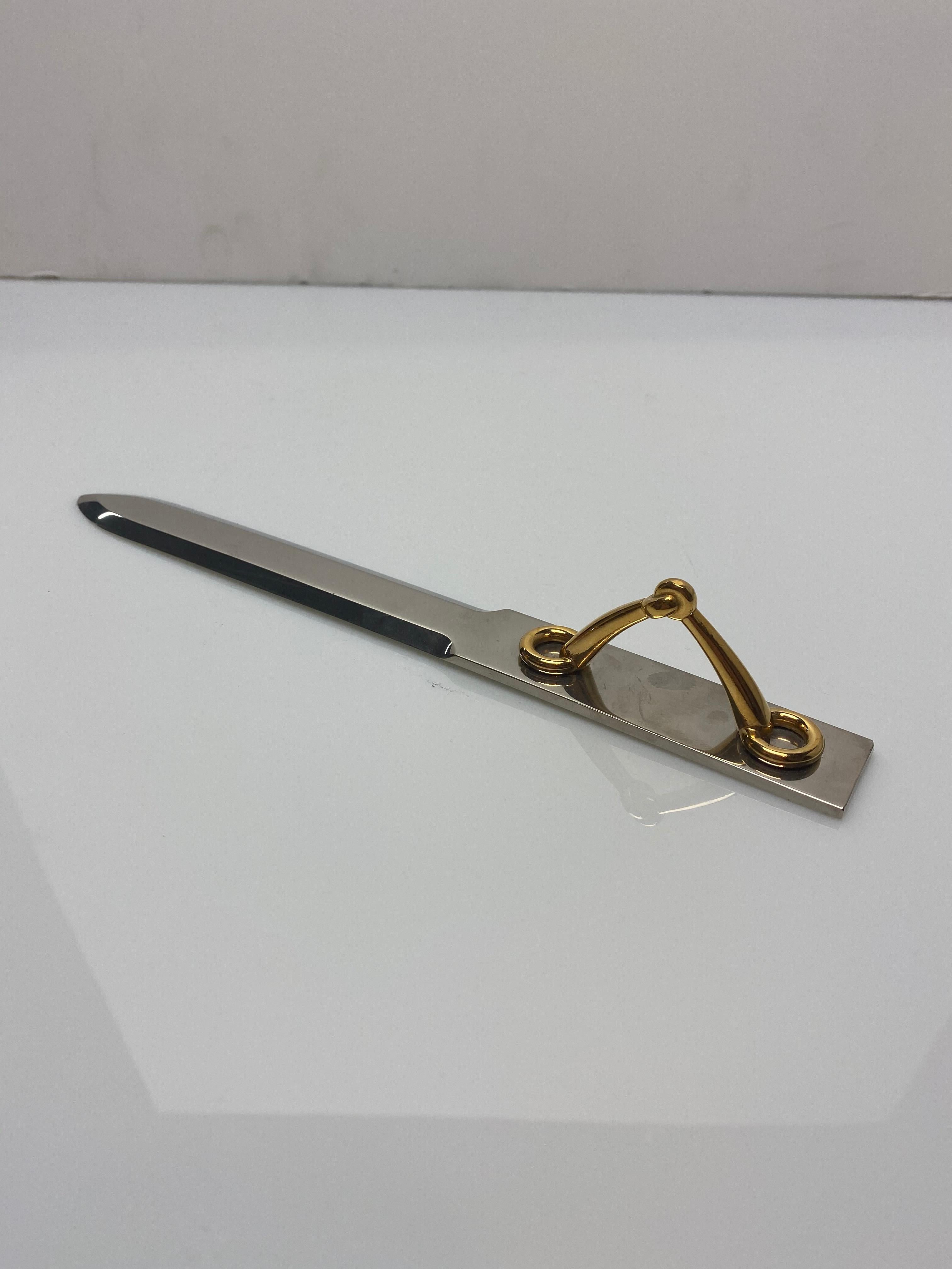A fine and elegant letter opener by Hermes. Featuring a gold-plated horse bit used as the handle of the letter opener.