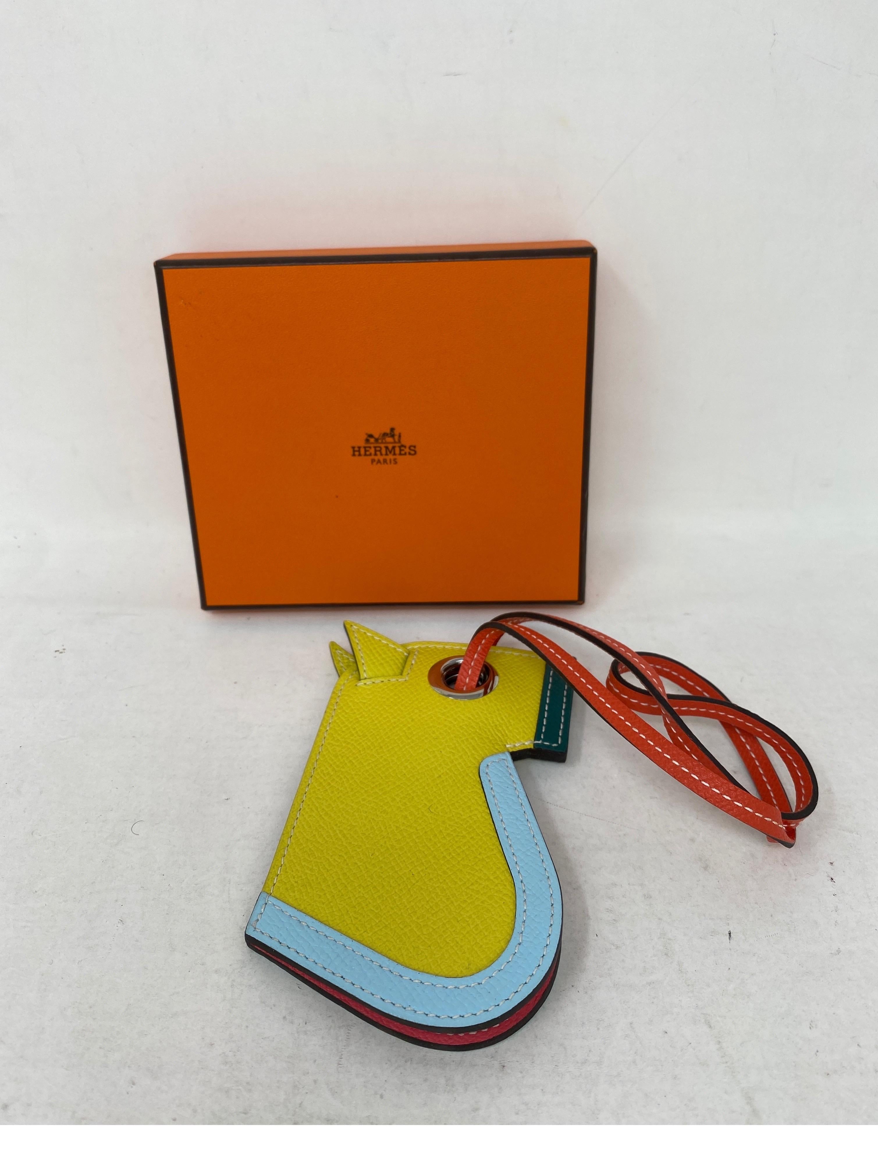 Hermes Yellow Horse Head Purse Charm holder. Mint new condition charm for bags. Guaranteed authentic. 