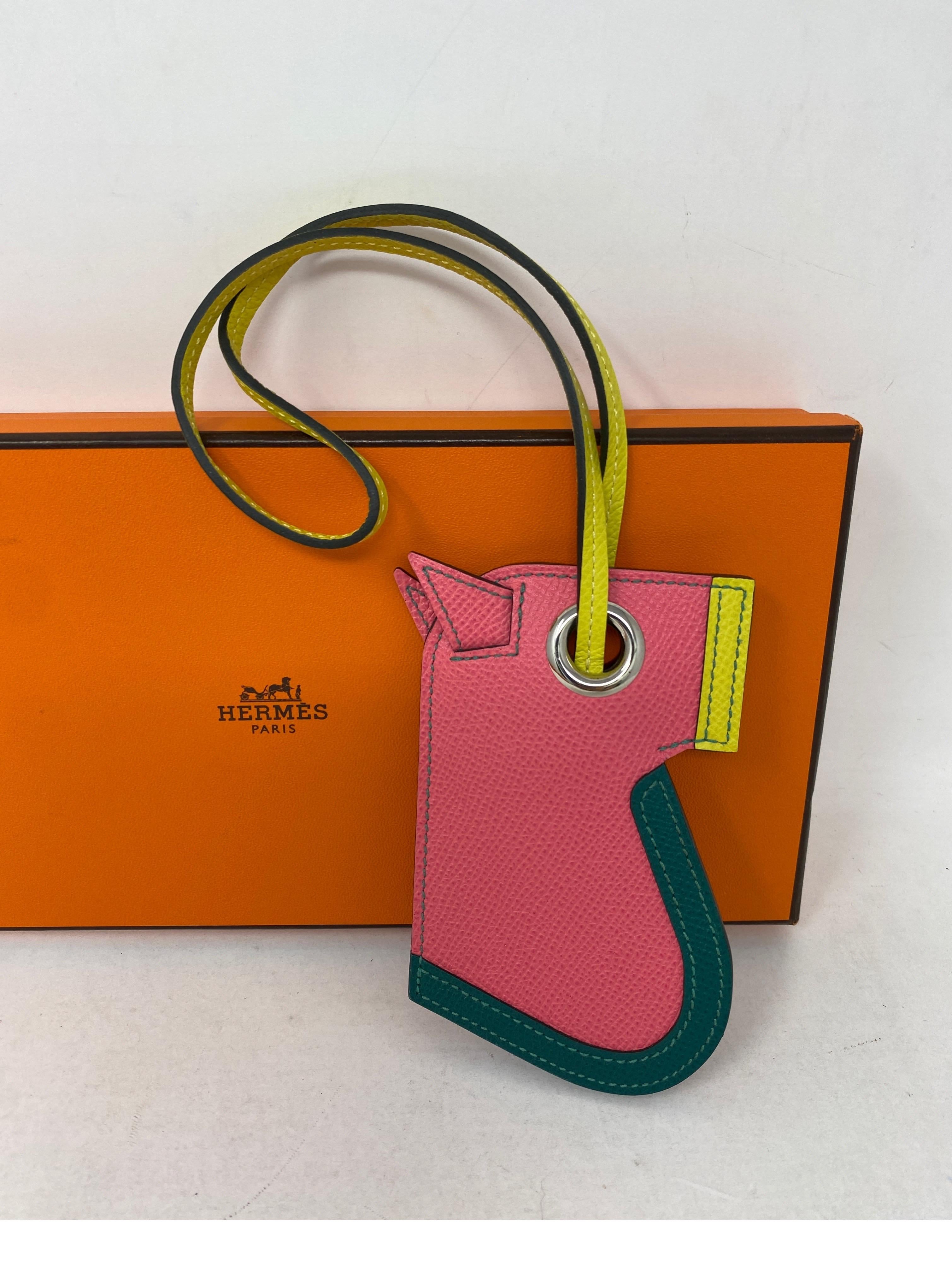 Hermes Horse Purse Charm holder. Pink leather horse head with yellow and green trim. New condition. Rare and limited horse charm. Guaranteed authentic. 