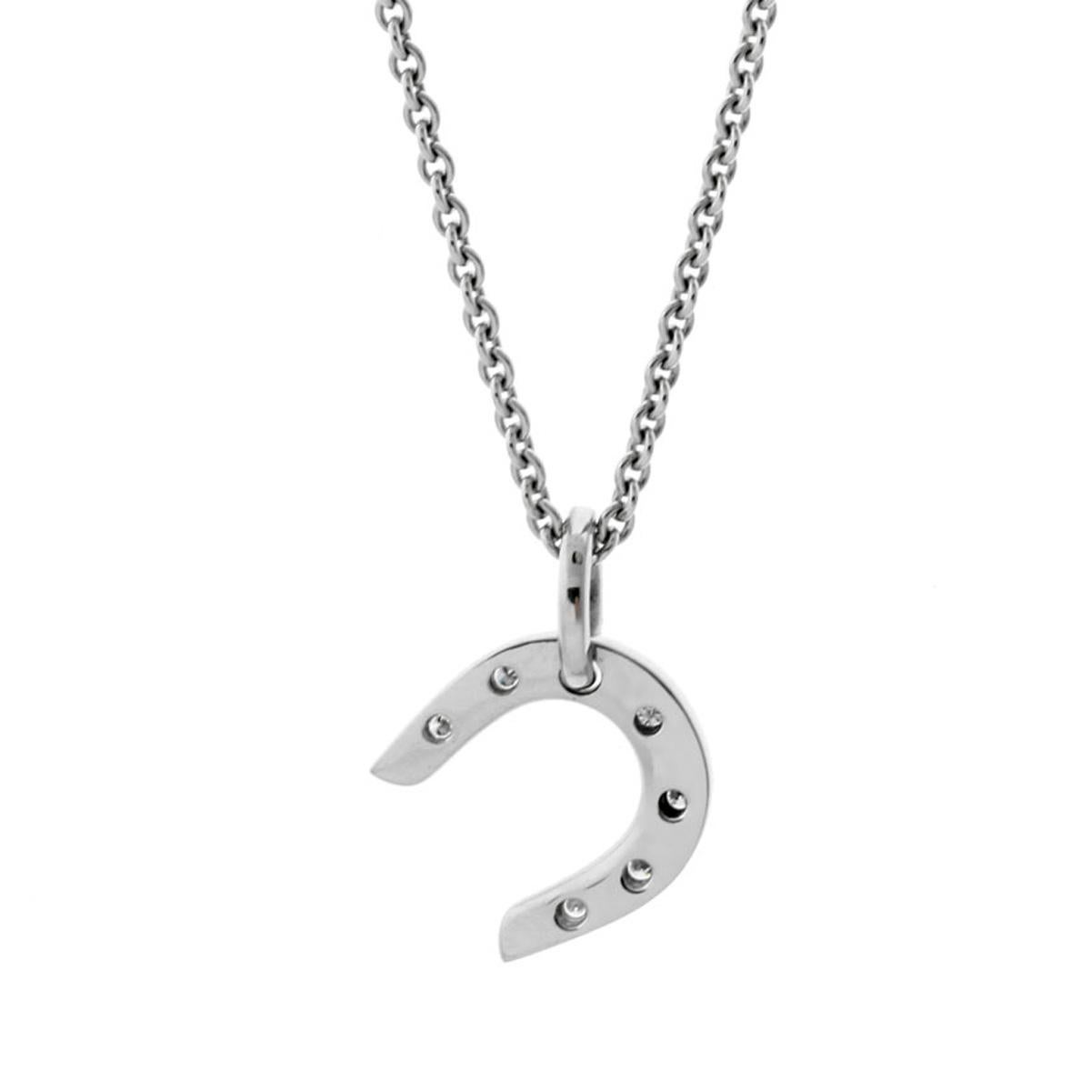 A chic Hermes horseshoe diamond necklace crafted in 18k white gold set with Hermes round brilliant cut diamonds. Sku 1265