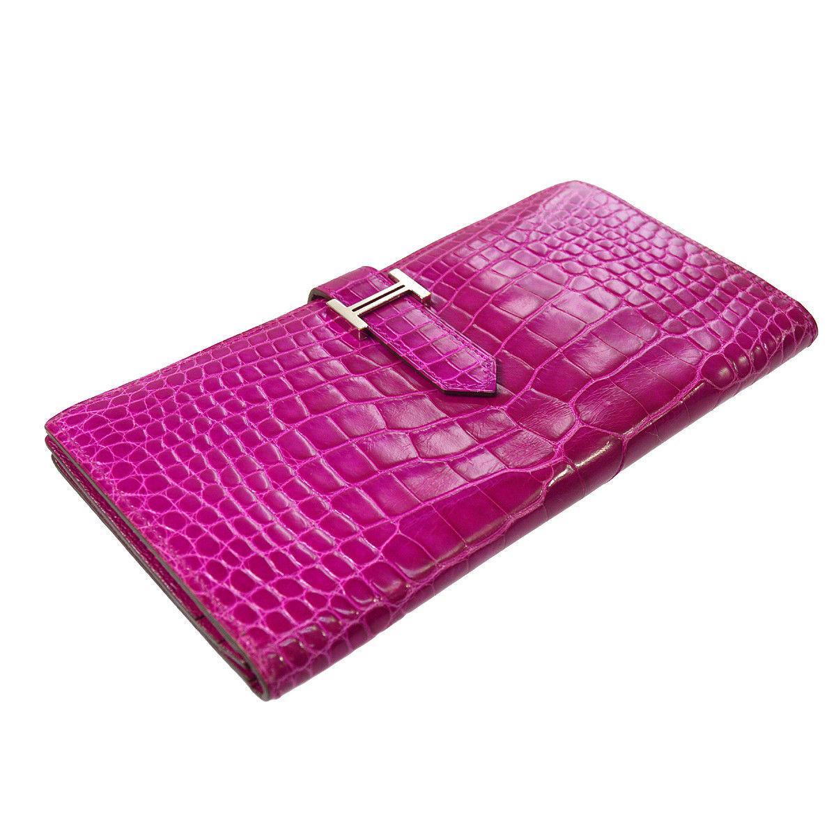 Hermes Hot Pink Crocodile Palladium Evening Clutch Wallet Bag in Box

Alligator 
Palladium hardware
Fold in buckle closure
Leather lining
Date code present
Made in France
Features zip closure, bill compartment and card slots 
Measures 7.75