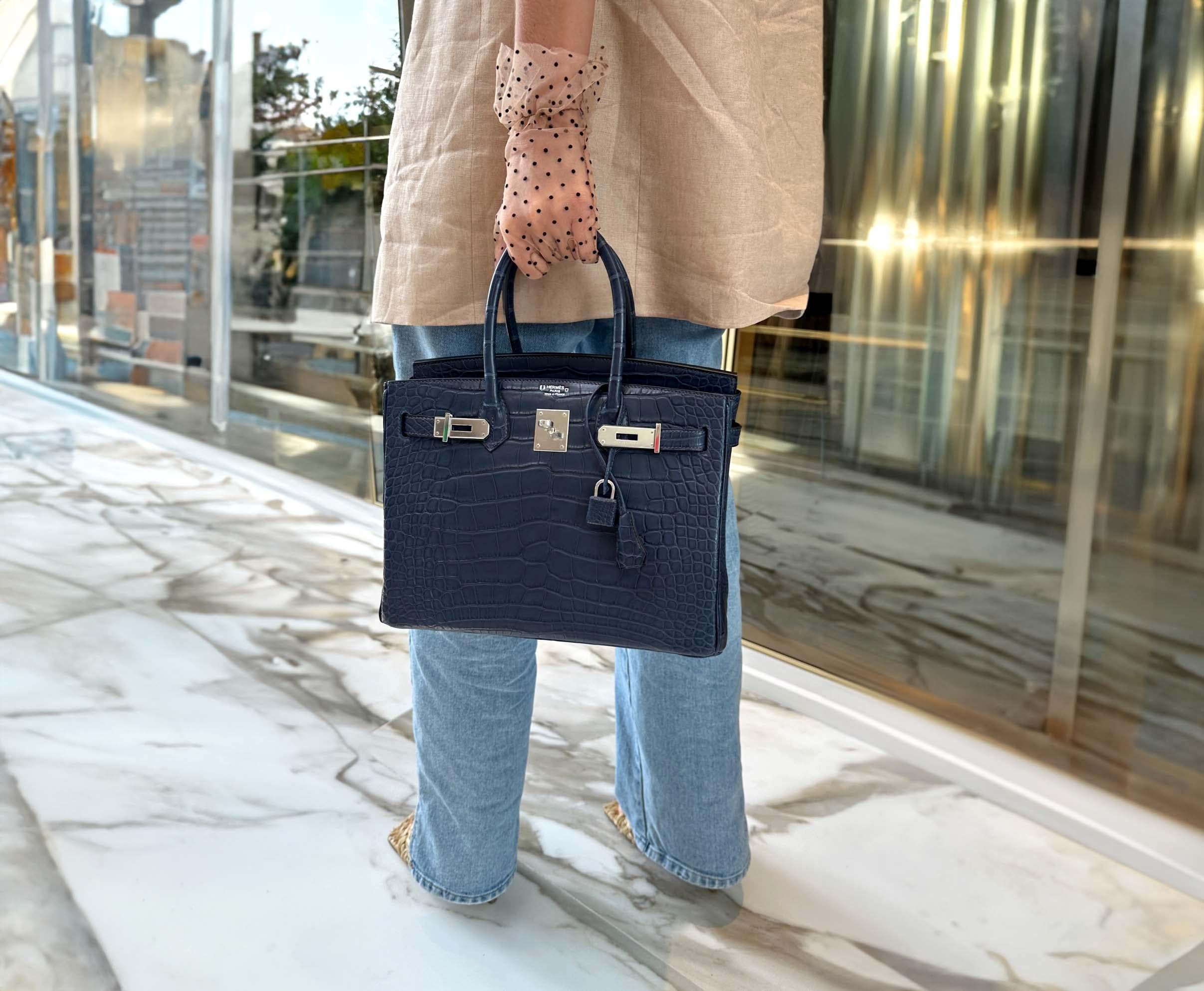 Hermès HSS Birkin 30 Blue Marine Matte Alligator & Cassis Interior PHW

In the exalted realm of luxury, Hermès Special Orders, known as 'HSS' or HorseShoe Stamp, represent the pinnacle of craftsmanship and exclusivity. Offered only to an elite