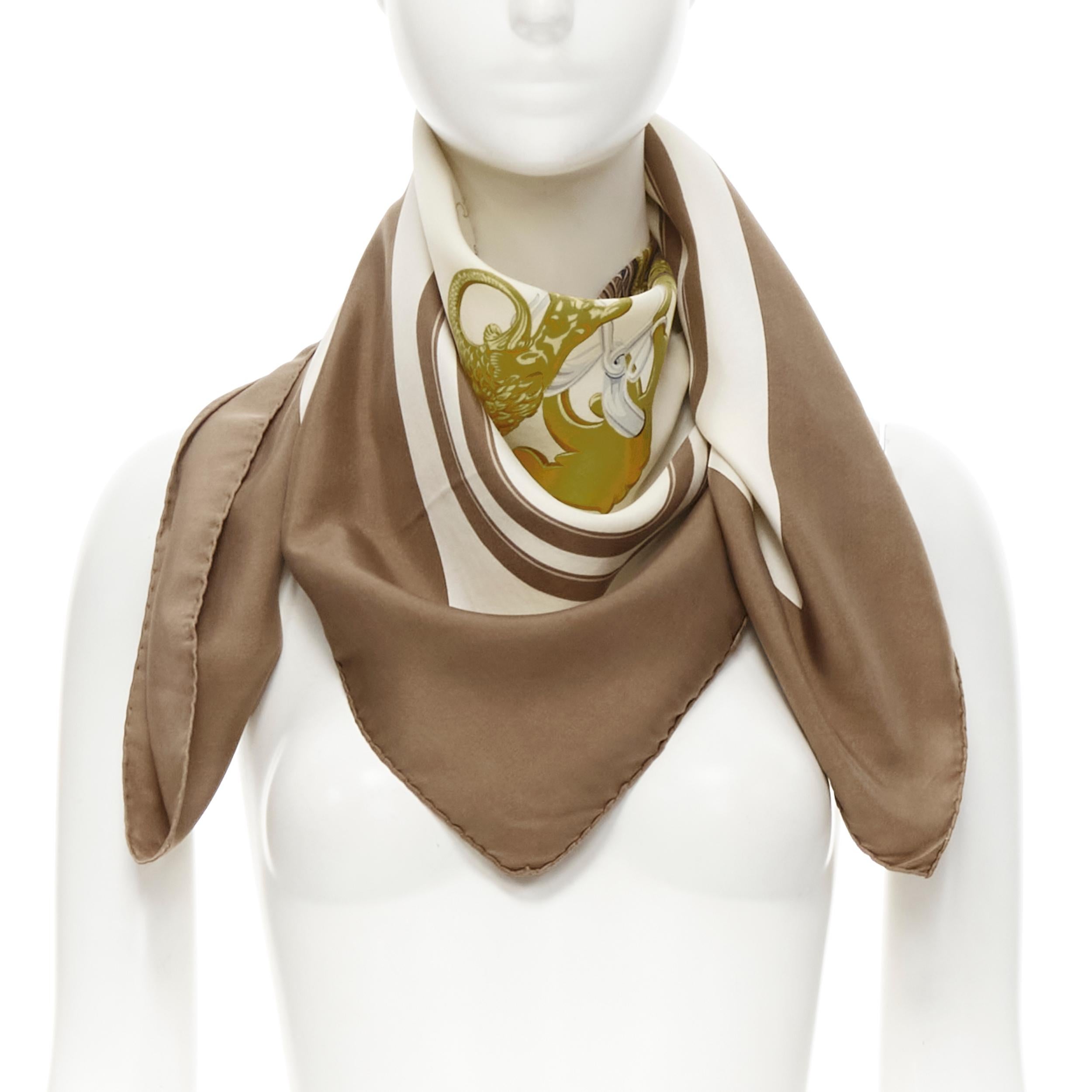 HERMES Hugo Grygkar Brides de Gala brown white print silk scarf 90cm 
Reference: AEMA/A00075 
Brand: Hermes 
Material: Silk 
Color: Brown 

CONDITION: 
Condition: Good, this item was pre-owned and is in good condition. 
Please refer to image gallery