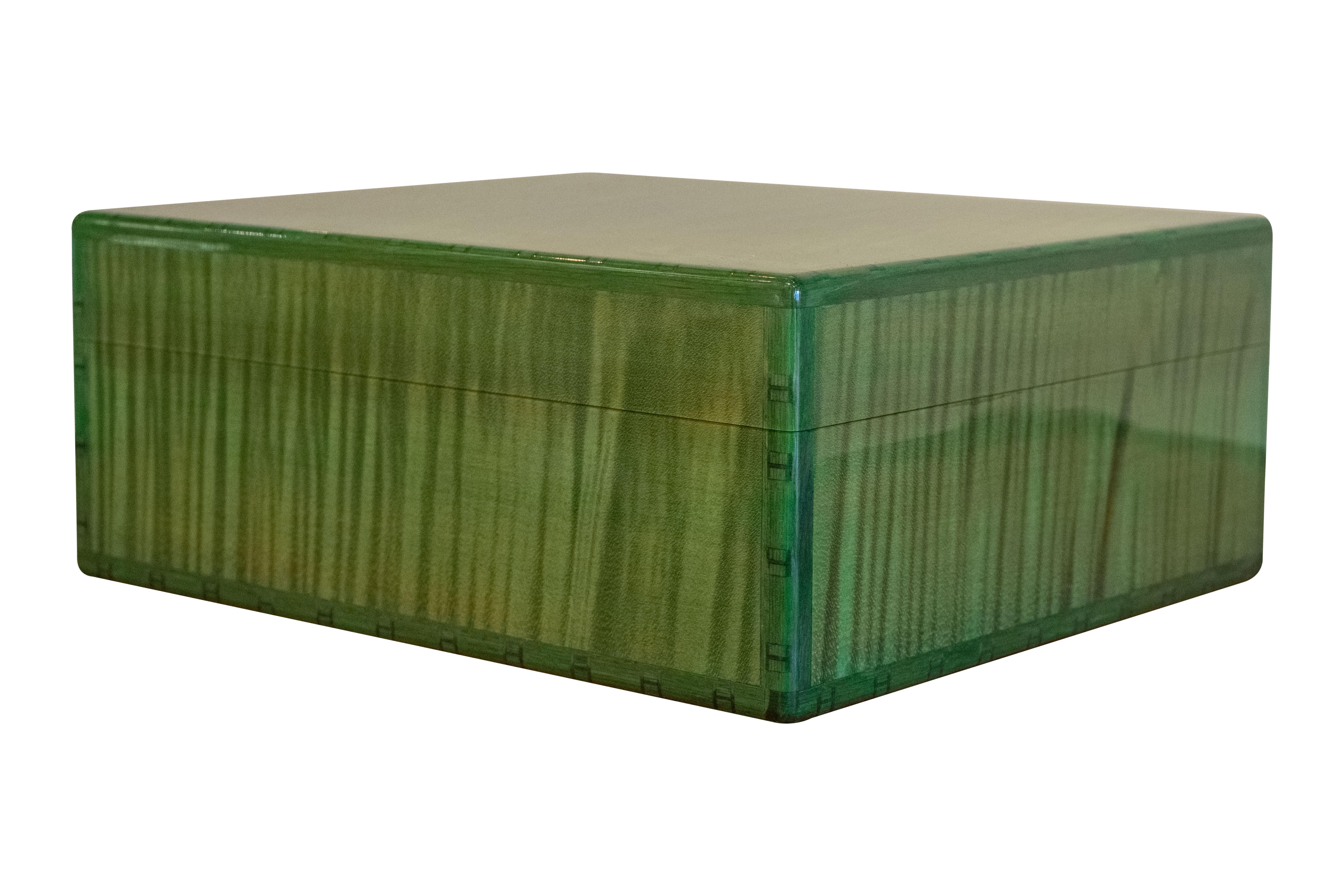 Designed to maintain cigars’ moisture levels, this Hermès Humidor has an inside lining of cedar wood. The outside is a beautiful, vibrant green. For those non-smokers, this Humidor could also double as a jewelry box, or a box for any type of knick