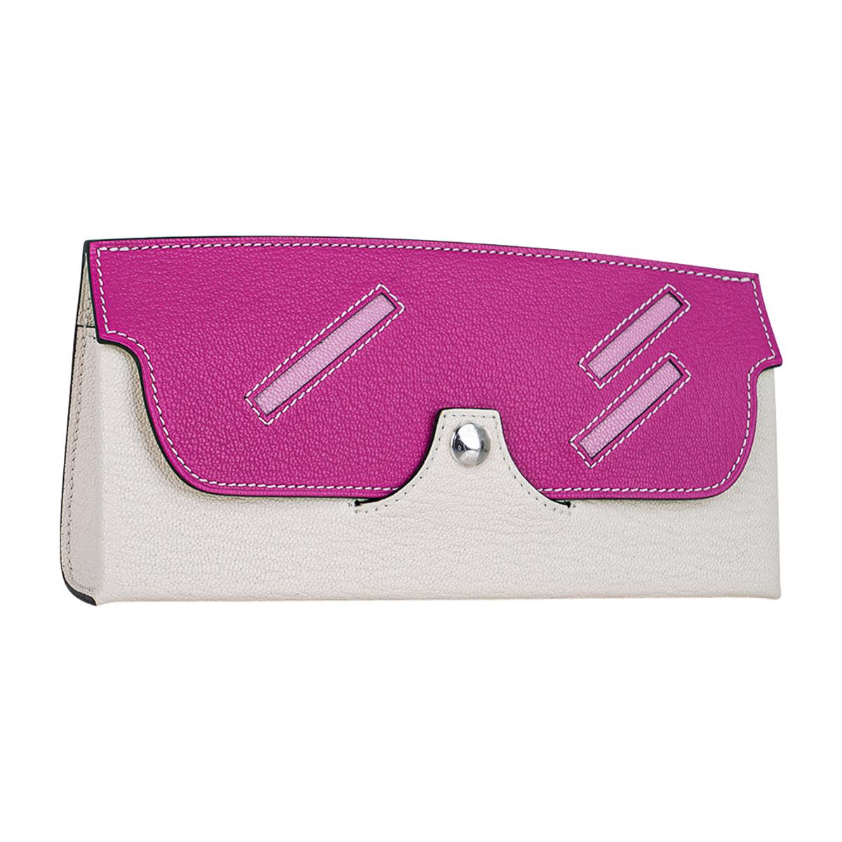 Mightychic offers a rare Hermes In The Loop Wink Glasses Case is whimsical and delightful.
Featured in Nata, Magnolia and Mauve Sylvestre.
Open the case for more fun.
The Wink is Citron with a leather Hermes Sellier plaque in Cuivre.
Mysore Chevre