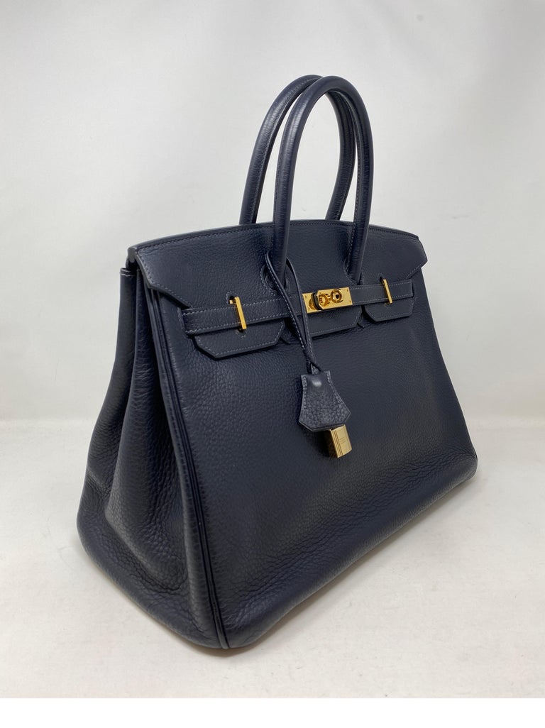 Hermes Indigo Birkin 35 Bag. Gold hardware. Very dark navy almost black color. Good condition. Includes clochette, lock, keys, and dust cover. Guaranteed authentic. 