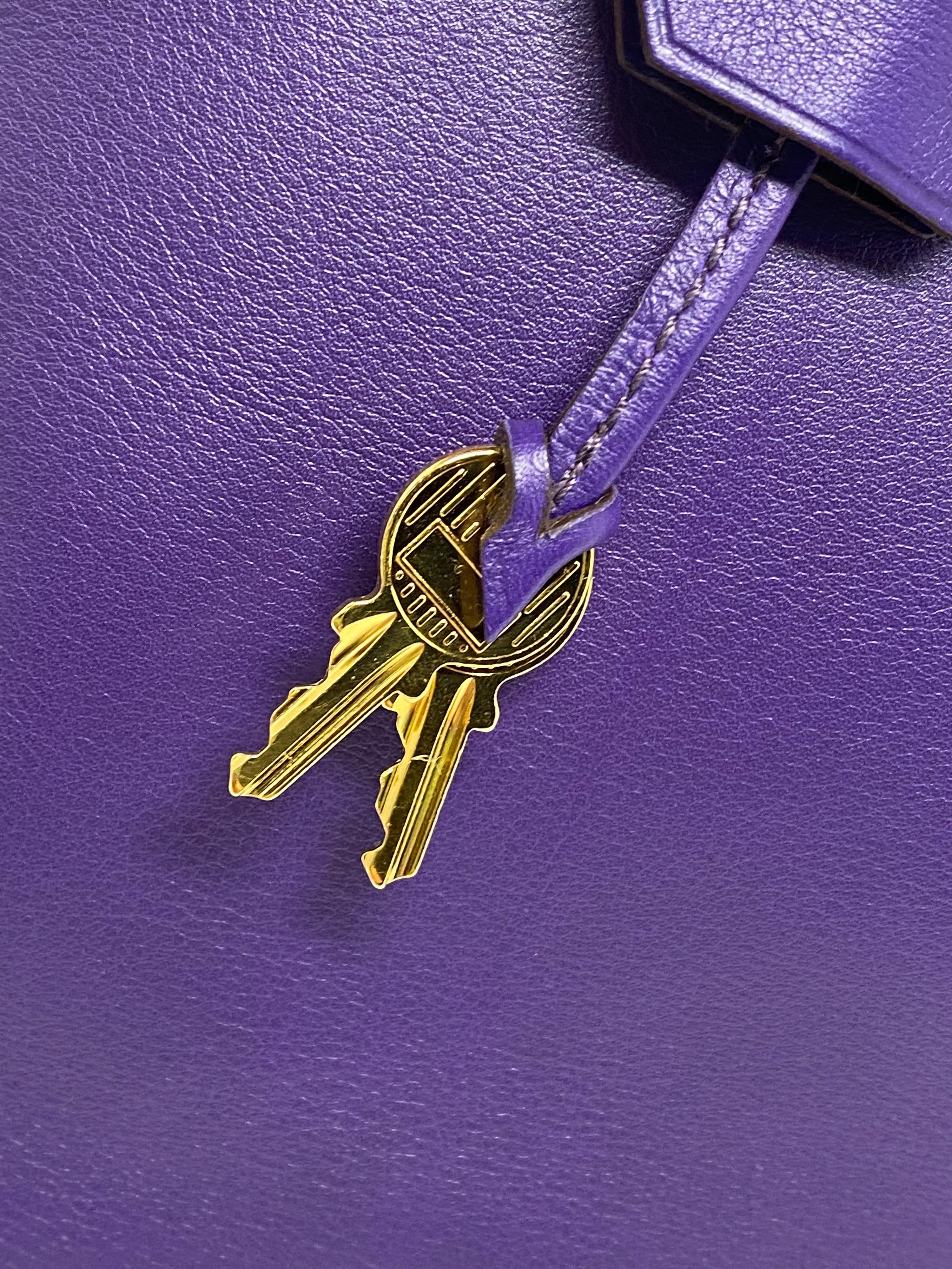 Hermes Iris Purple Birkin 35 Bag. Beautiful color and swift leather with gold hardware. Excellent condition. Rare and hard to find color. Plastic is still on gold hardware. Includes clochette, locks, and keys. Dust cover included. Guaranteed