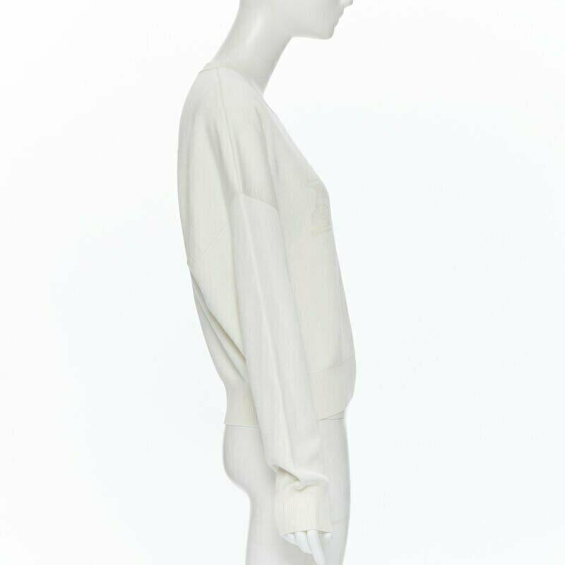 Pull court HERMES ivoire crème cachemire soie mélange logo intarsia FR44 XL Bon état - En vente à Hong Kong, NT